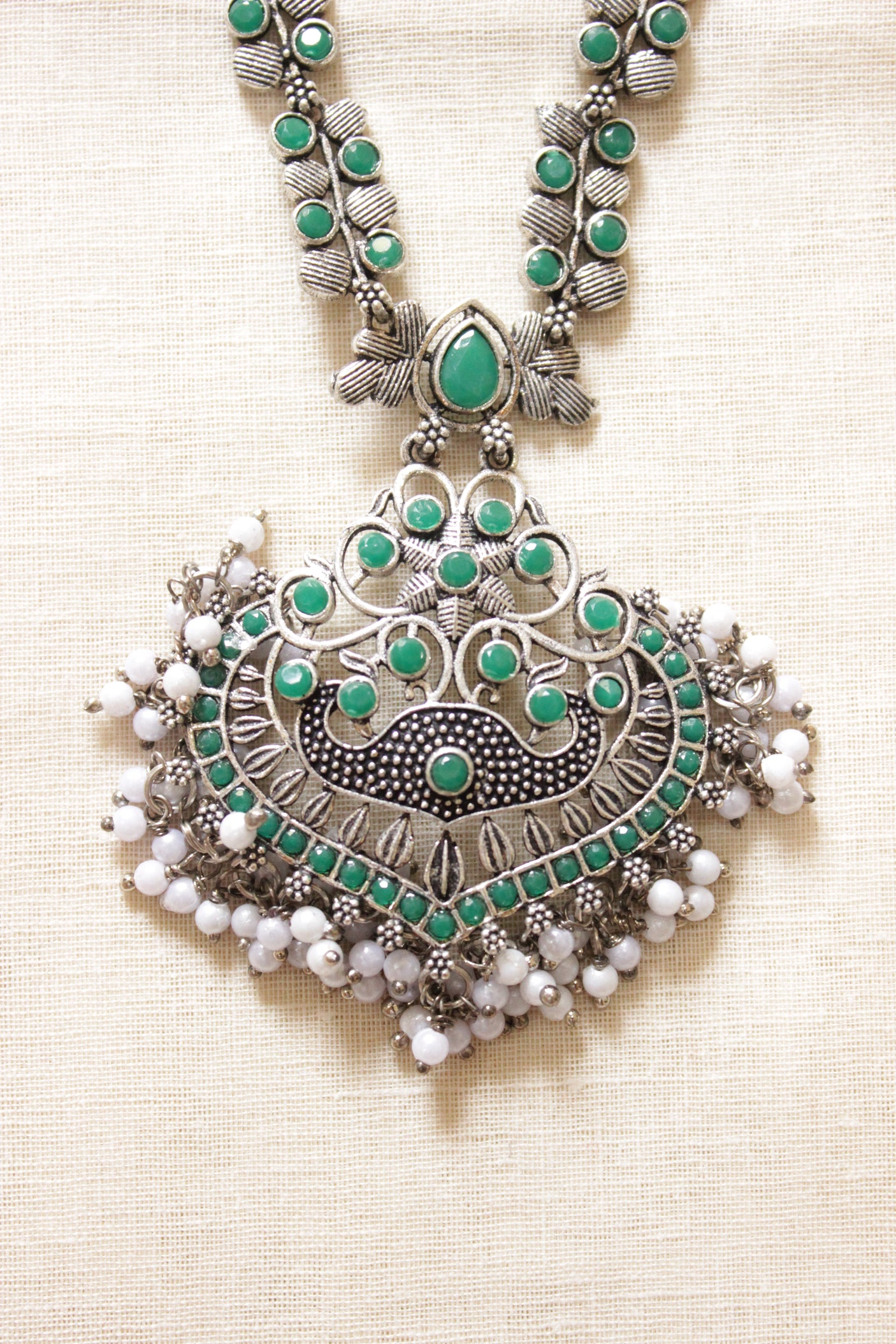 Green Glass Stones Embedded Silver Finish Peacock Motifs Chain Necklace Set