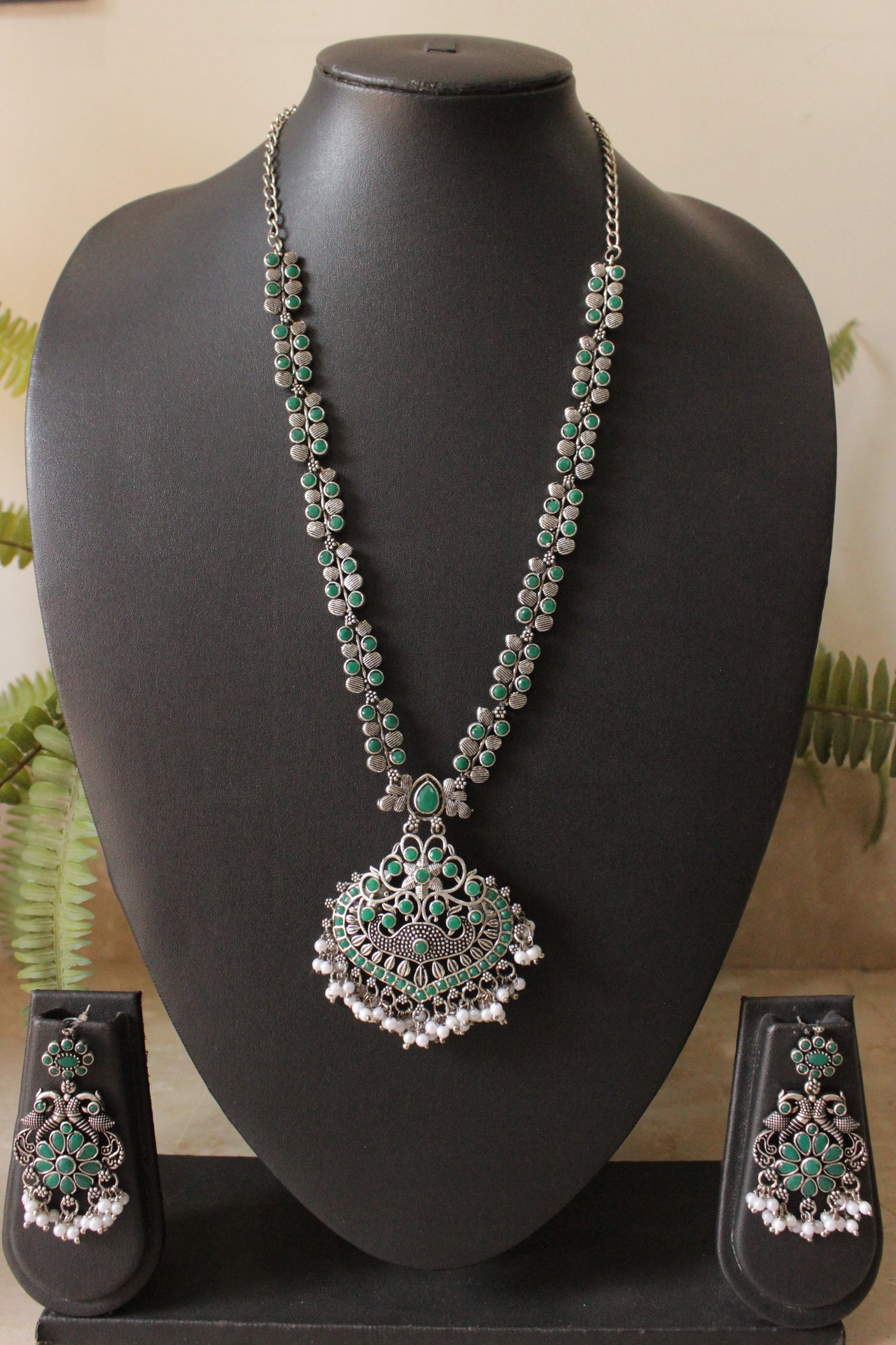 Green Glass Stones Embedded Silver Finish Peacock Motifs Chain Necklace Set