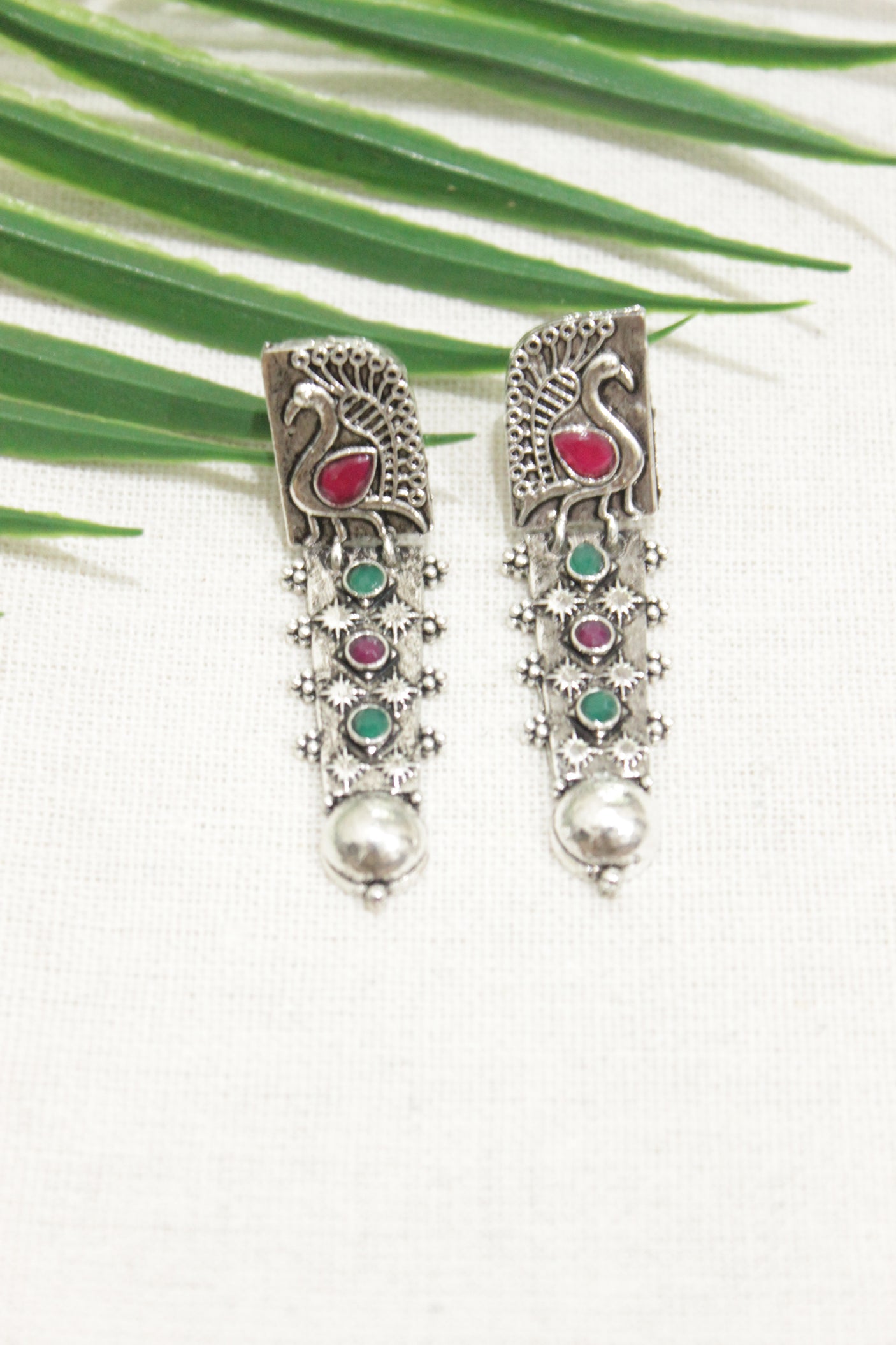 Peacock Motif Oxidised Finish Red & Green Stones Versatile Long Dangler Earrings