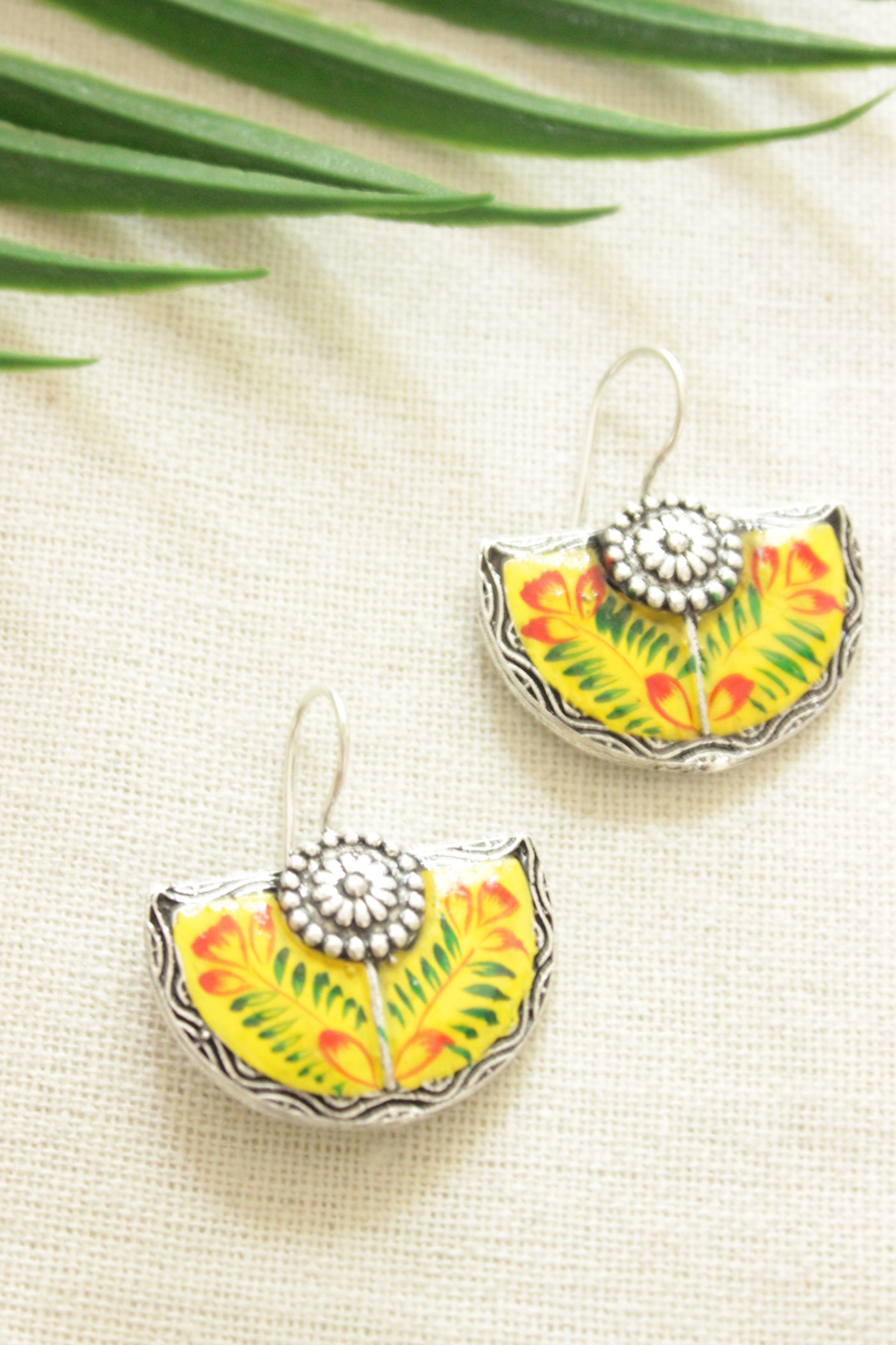 Yellow Enamel Painted Flower Motifs Half Moon Oxidised Finish Metal Earrings