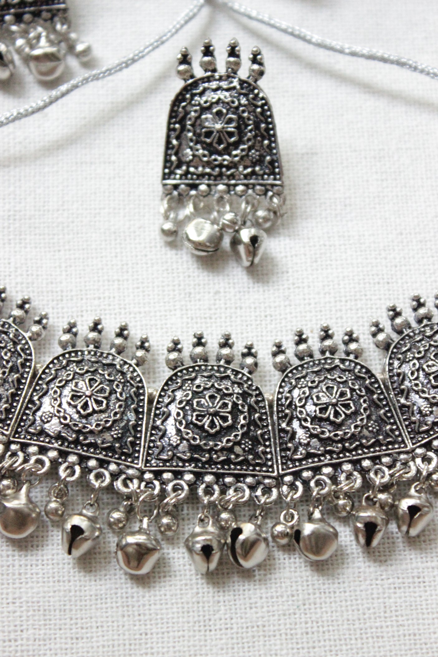 Elaborate Oxidised Finish Choker Necklace Set Accentuated with Ghungroo Beads with Adjustable Closure