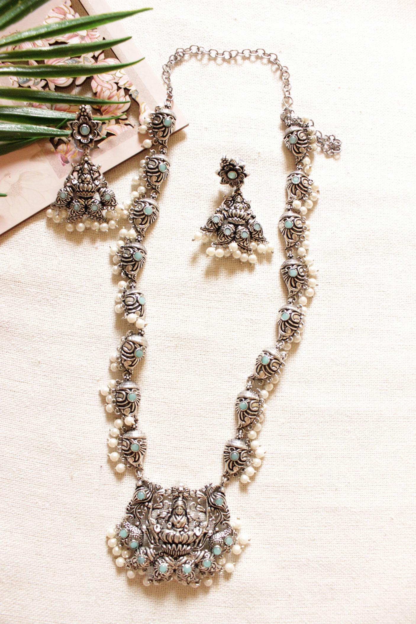 Oxidised Finish Premium Turquoise Stones Embedded Religious Motif Long Brass Necklace Set