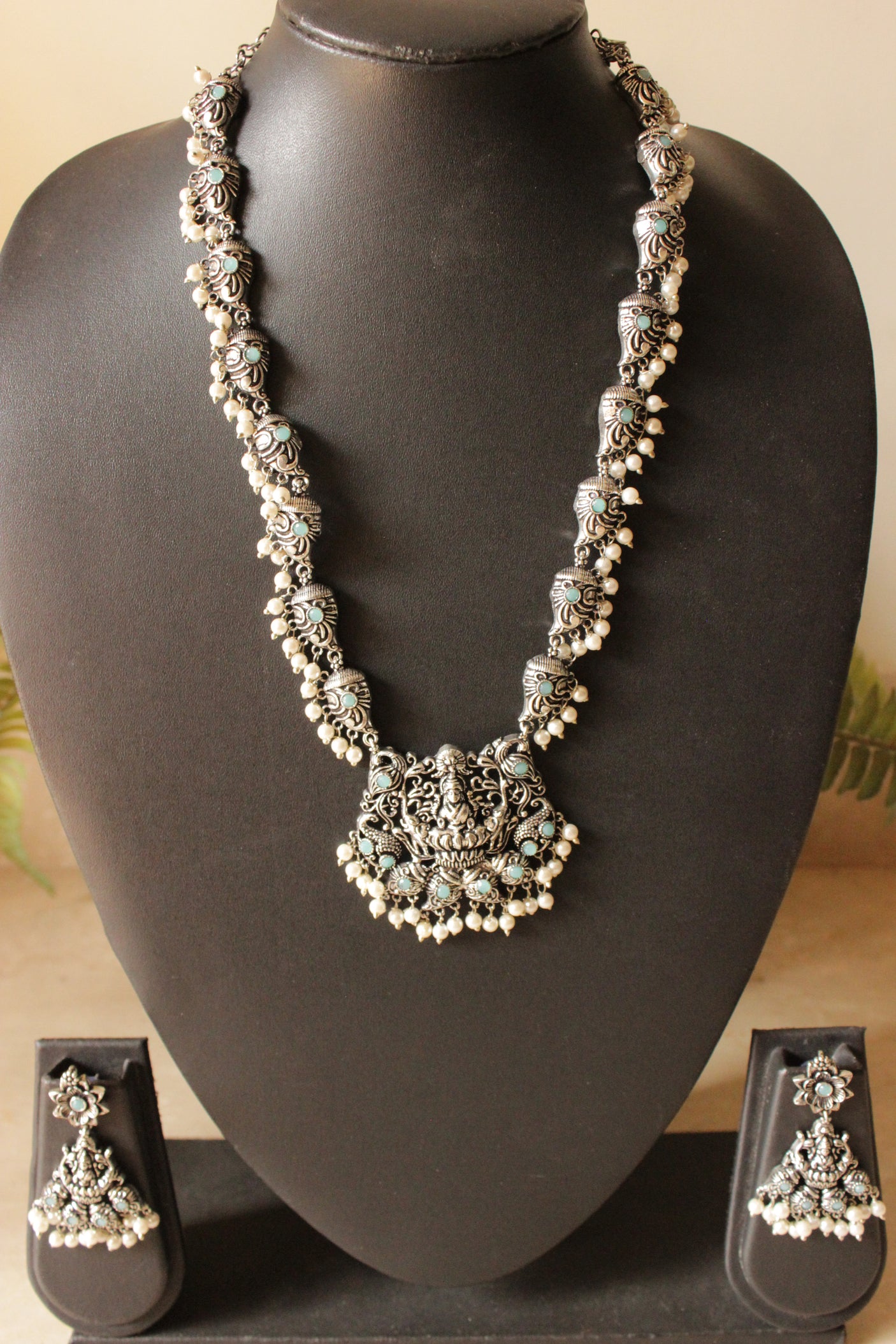 Oxidised Finish Premium Turquoise Stones Embedded Religious Motif Long Brass Necklace Set