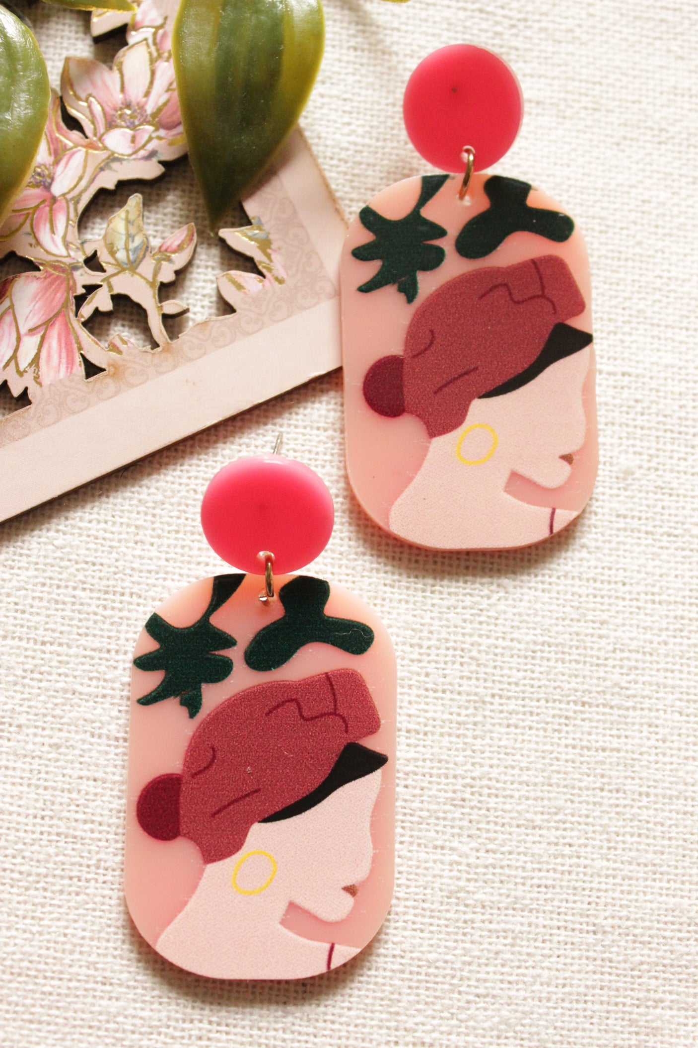 Shades of Pink and Green Woman Face Printed Acrylic Earrings