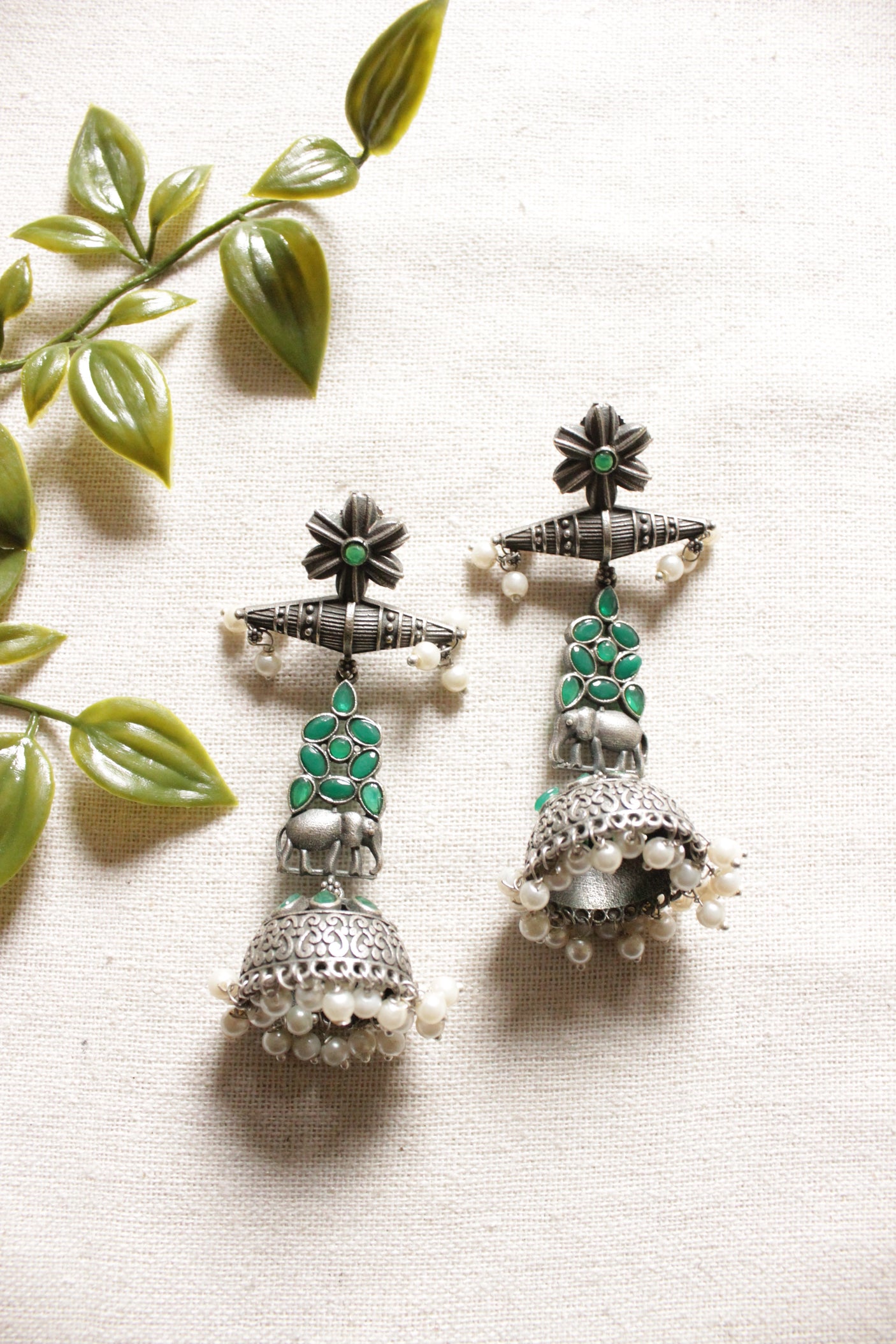 Oxidised Finish Green Glass Stones Embedded Elephant Motif Ethnic Jhumka Earrings