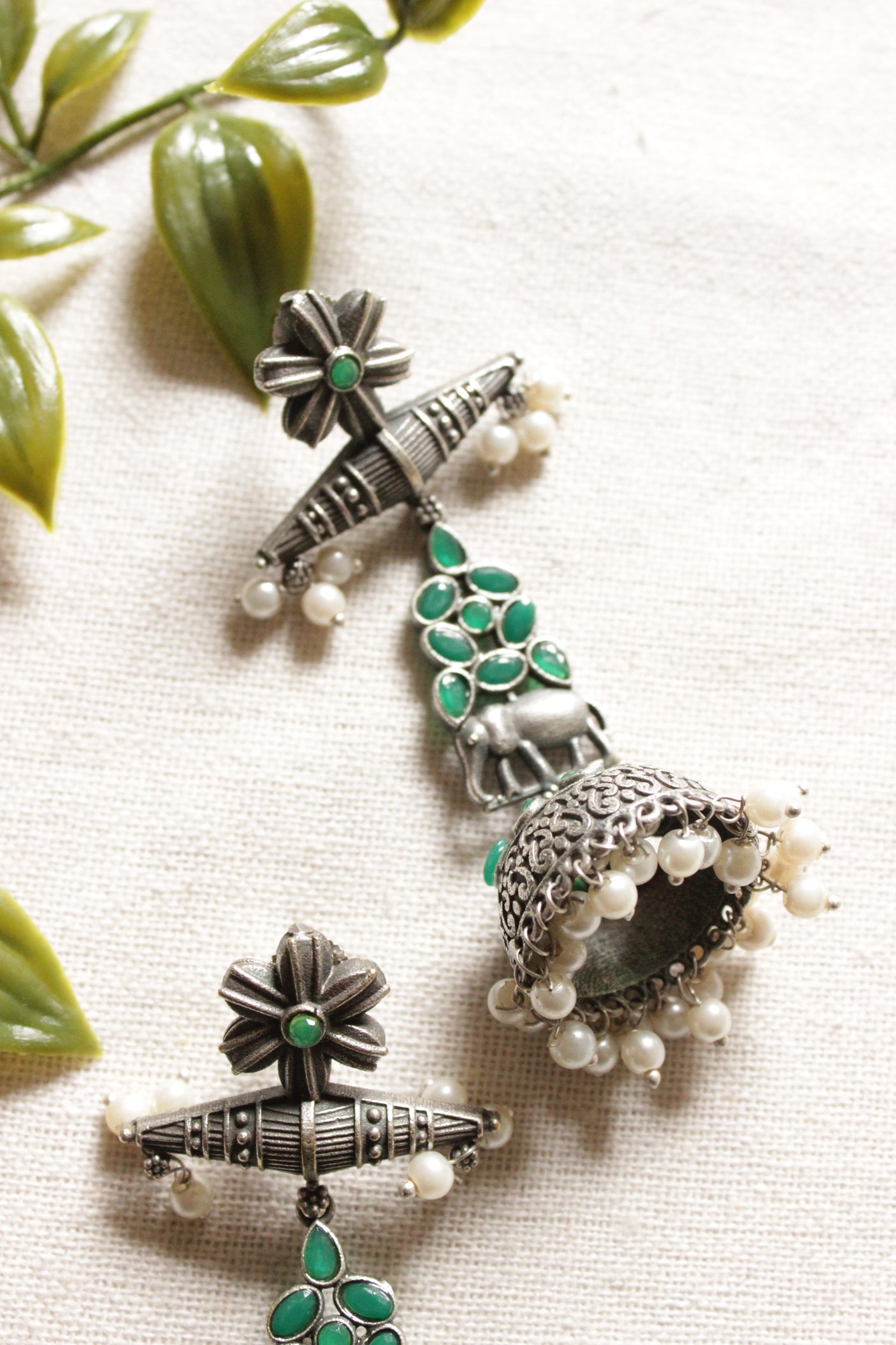 Oxidised Finish Green Glass Stones Embedded Elephant Motif Ethnic Jhumka Earrings