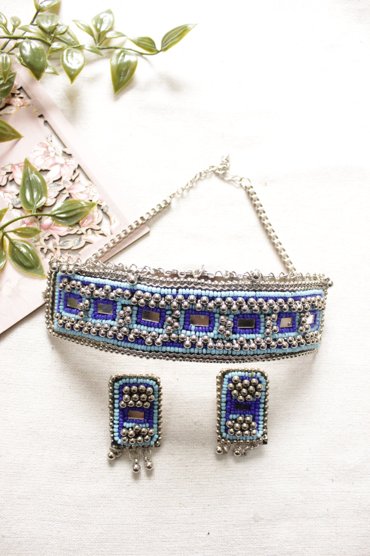 Shades of Blue Beaded Silver Finish Choker Necklace Set Embellished with Metal Ghungroo Beads
