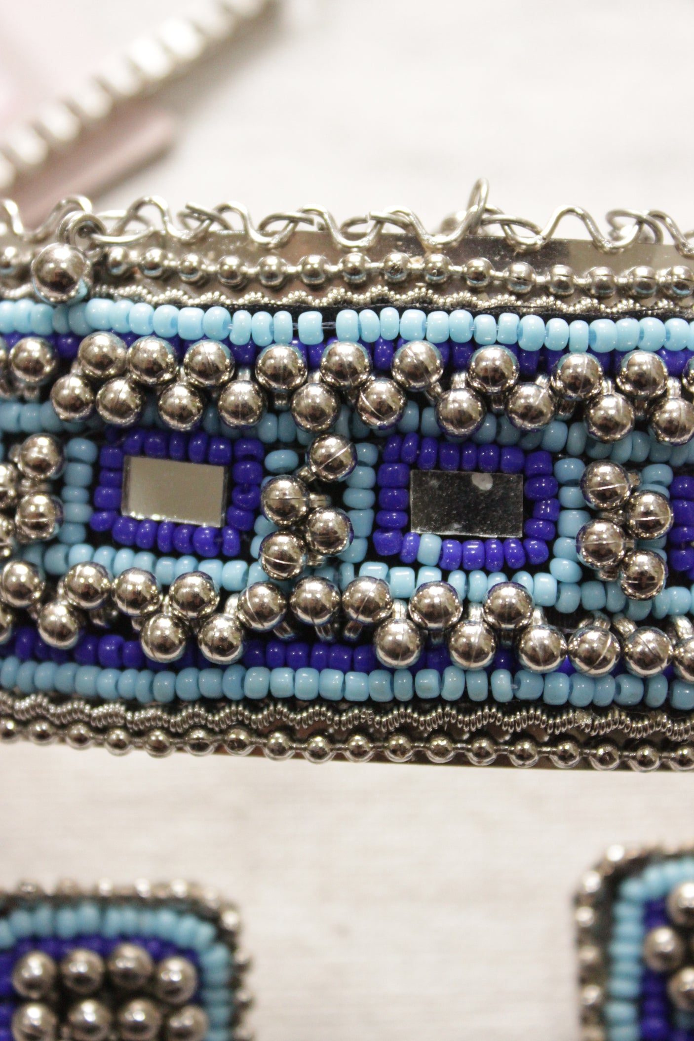 Shades of Blue Beaded Silver Finish Choker Necklace Set Embellished with Metal Ghungroo Beads