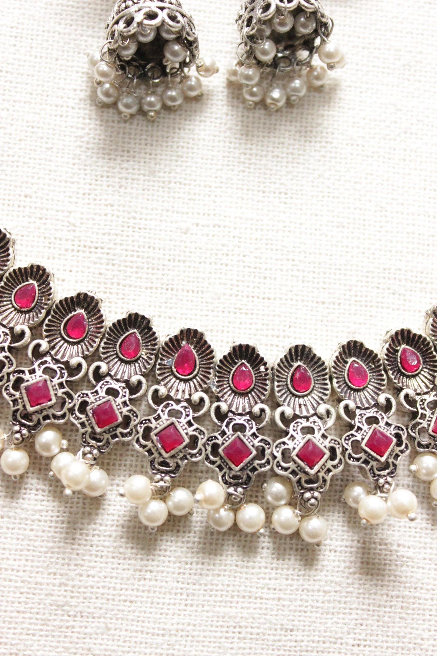 Pink Glass Stones Embedded Silver Finish Choker Style Necklace Set with Flower Jhumka Earrings