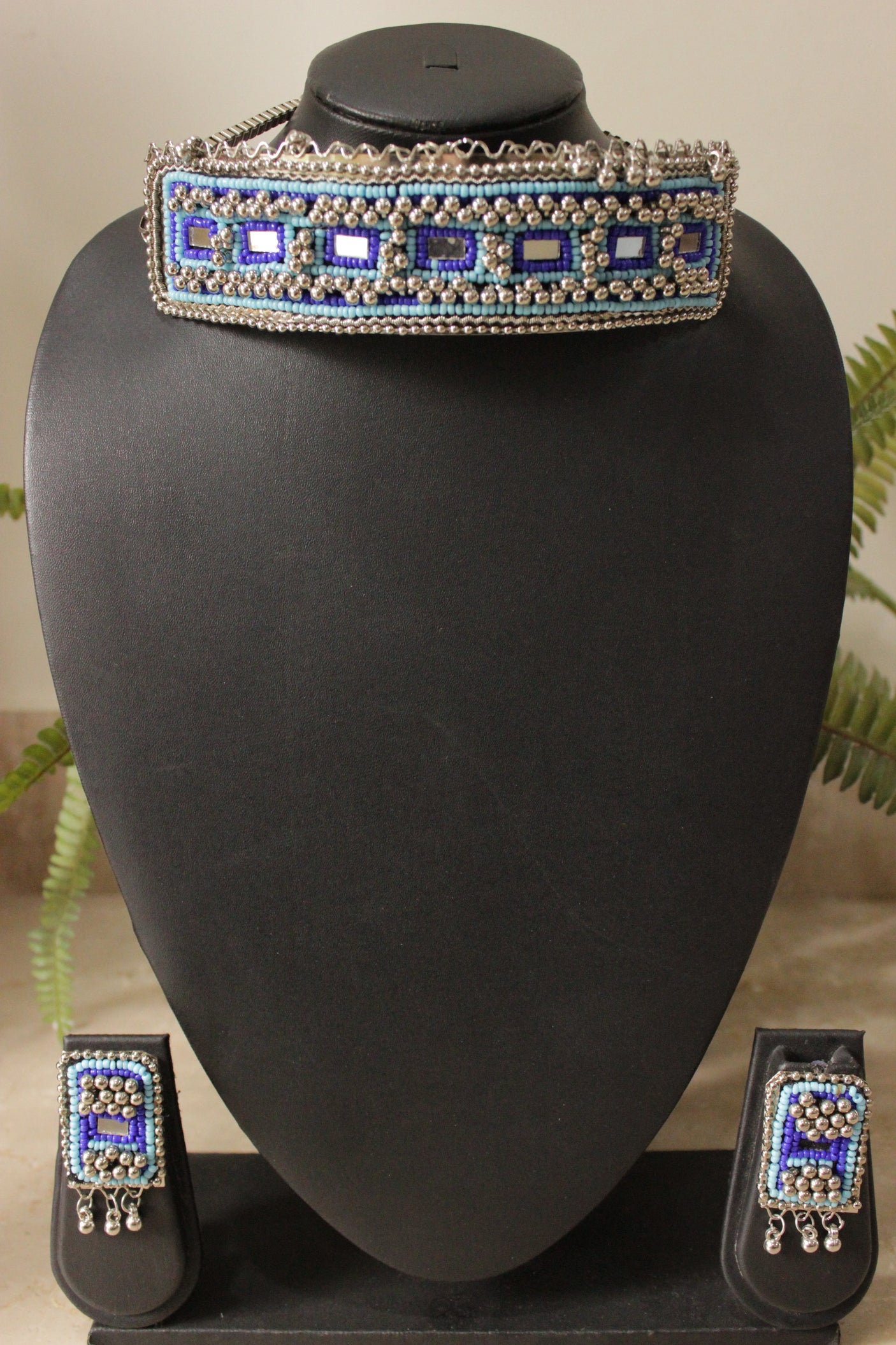 Shades of Blue Beaded Silver Finish Choker Necklace Set Embellished with Metal Ghungroo Beads
