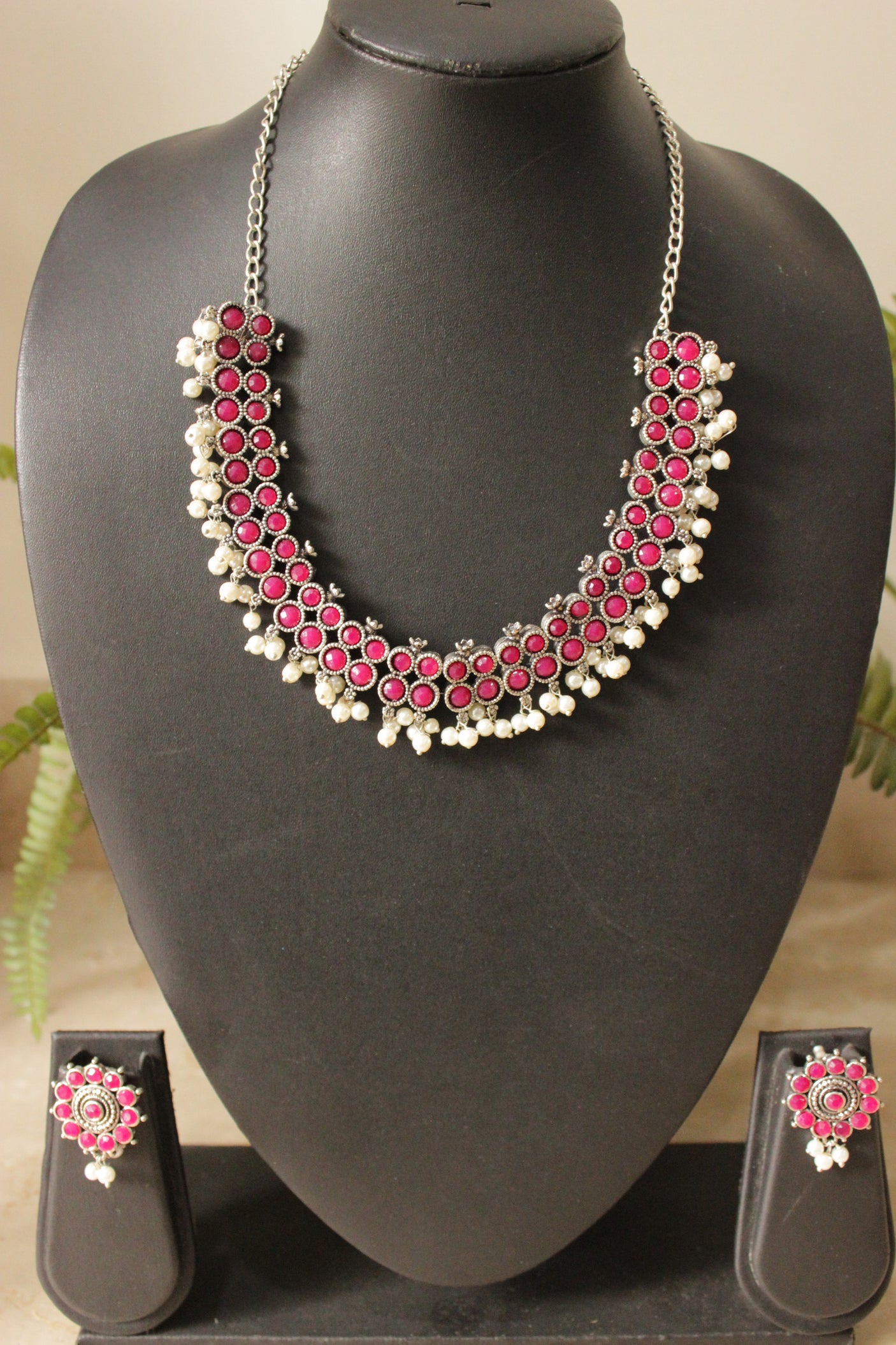 Ruby Glass Stones Embedded Silver Finish Choker Style Necklace Set with Flower Earrings