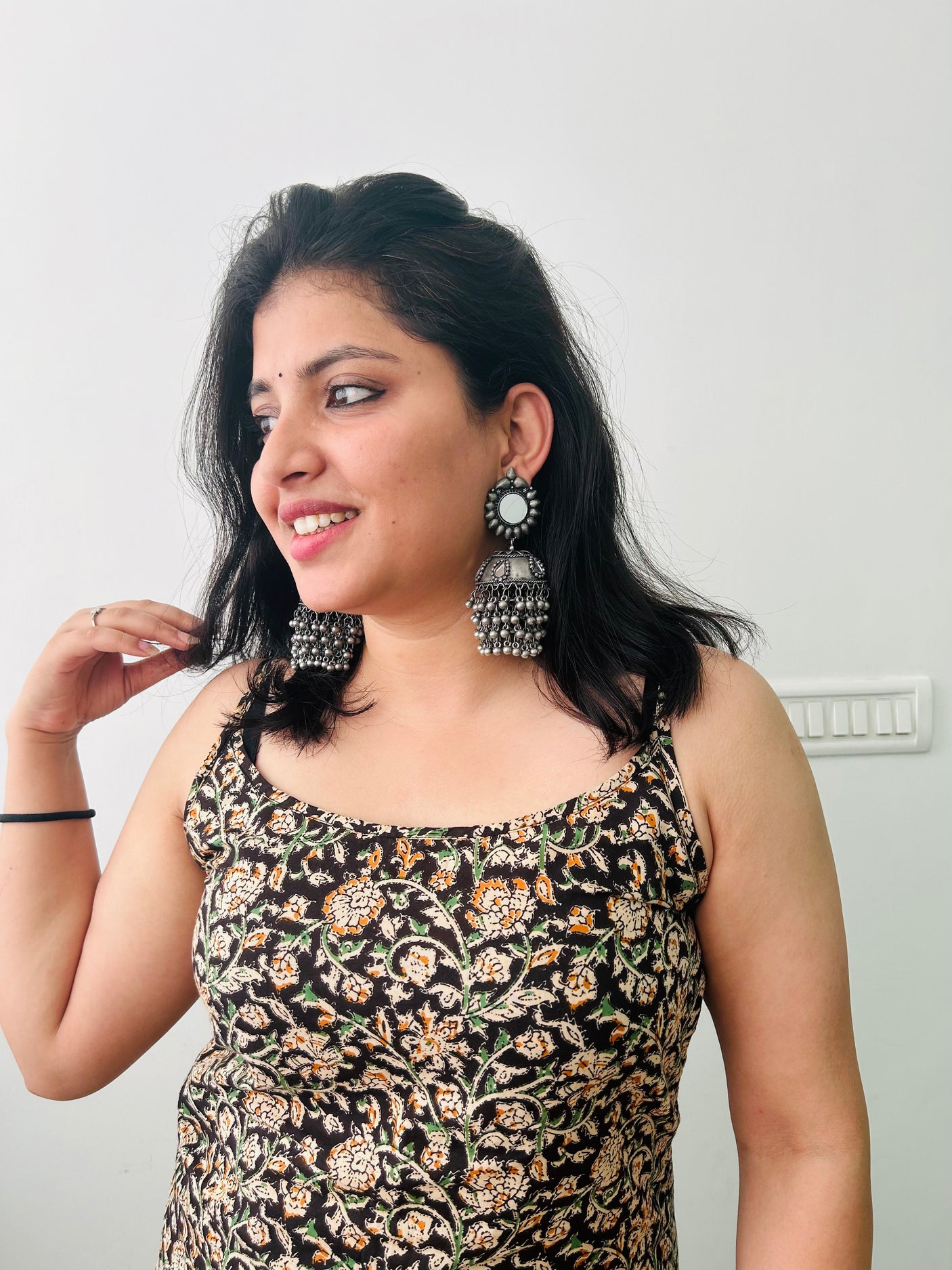 Mirror and Glass Stones Embedded Premium Oxidised Finish Brass Jhumka Earrings