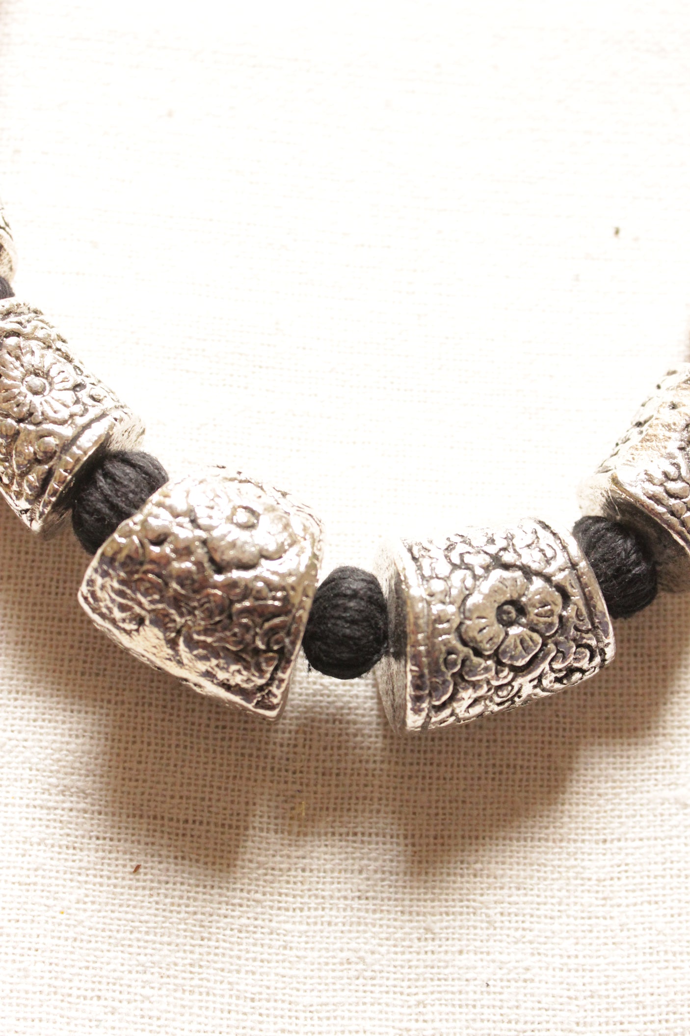 Intricately Detailed Metal Accents Braided with Black Fabric Threads Necklace Set