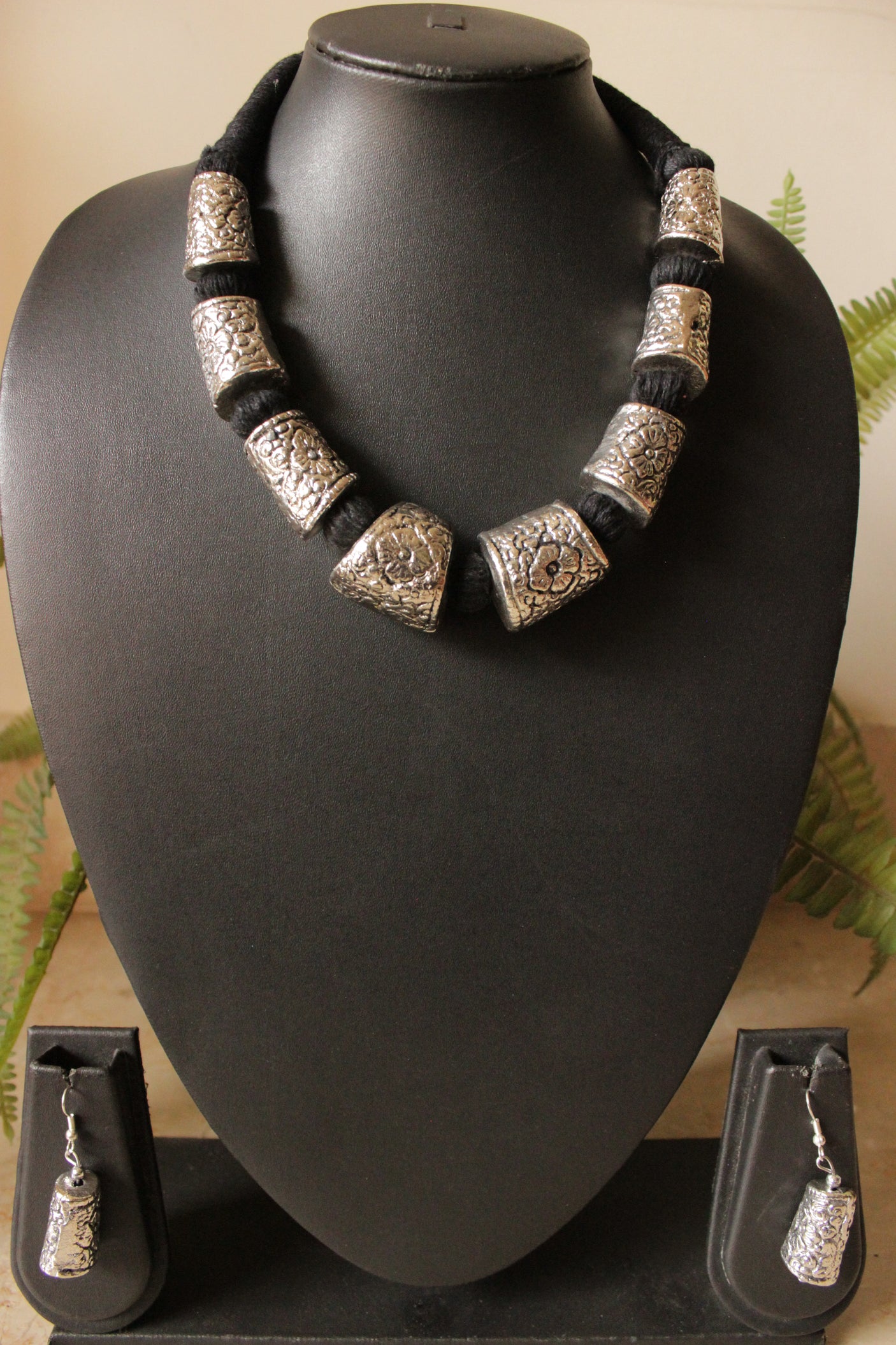Intricately Detailed Metal Accents Braided with Black Fabric Threads Necklace Set