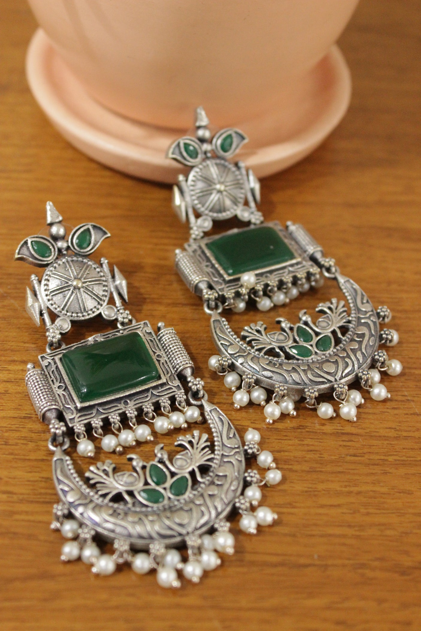 Intricately Detailed Dancing Peacock Dangler Earrings with Green Glass Stones Embedded