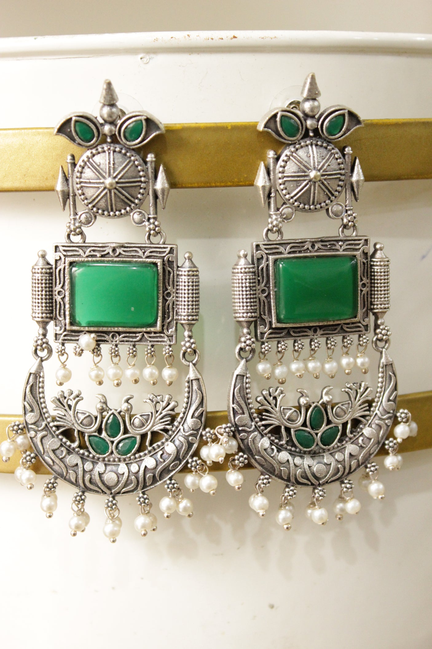Intricately Detailed Dancing Peacock Dangler Earrings with Green Glass Stones Embedded