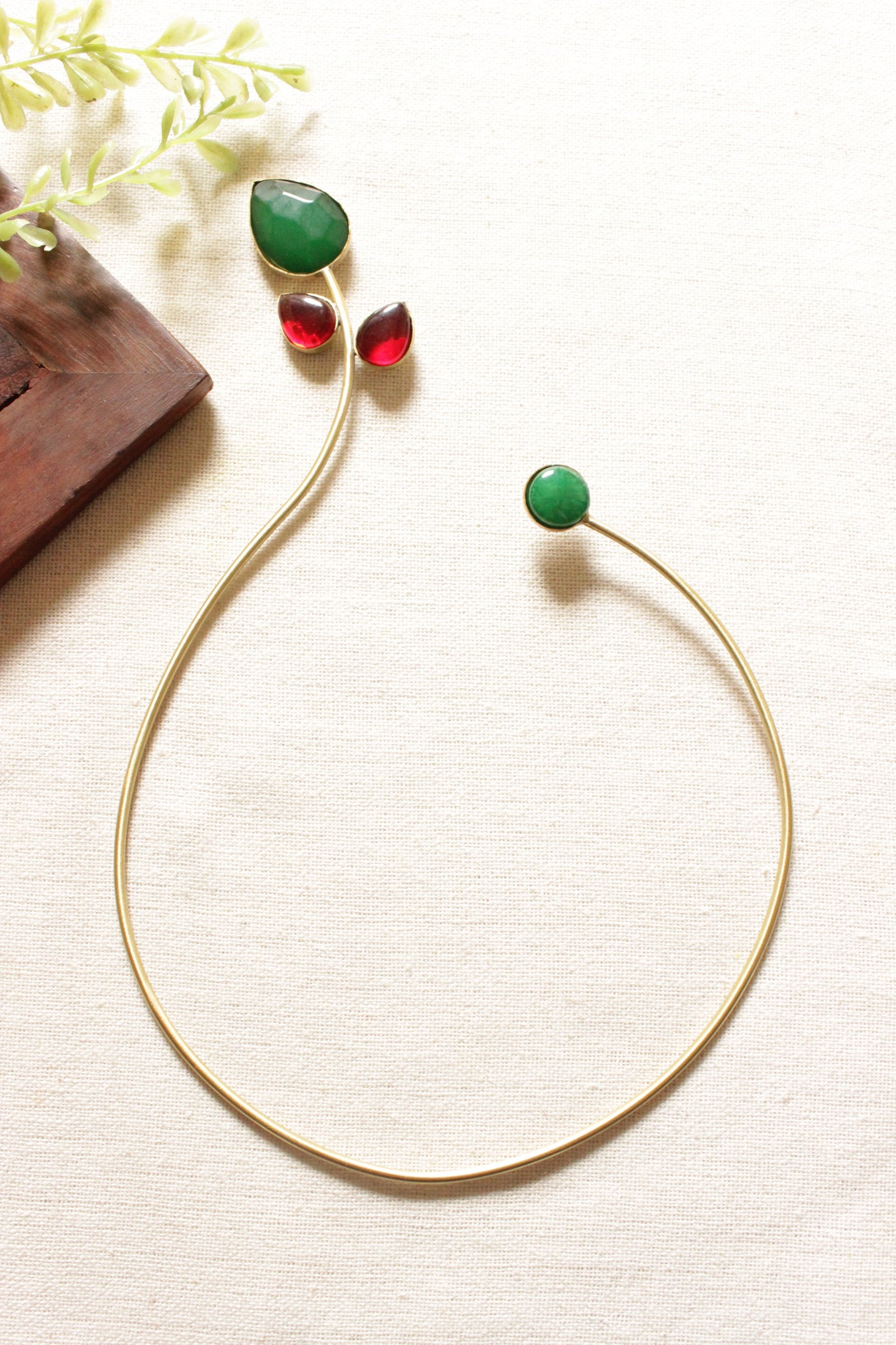 Gold Toned Brass Choker Necklace Embedded with Red and Green Gemstones