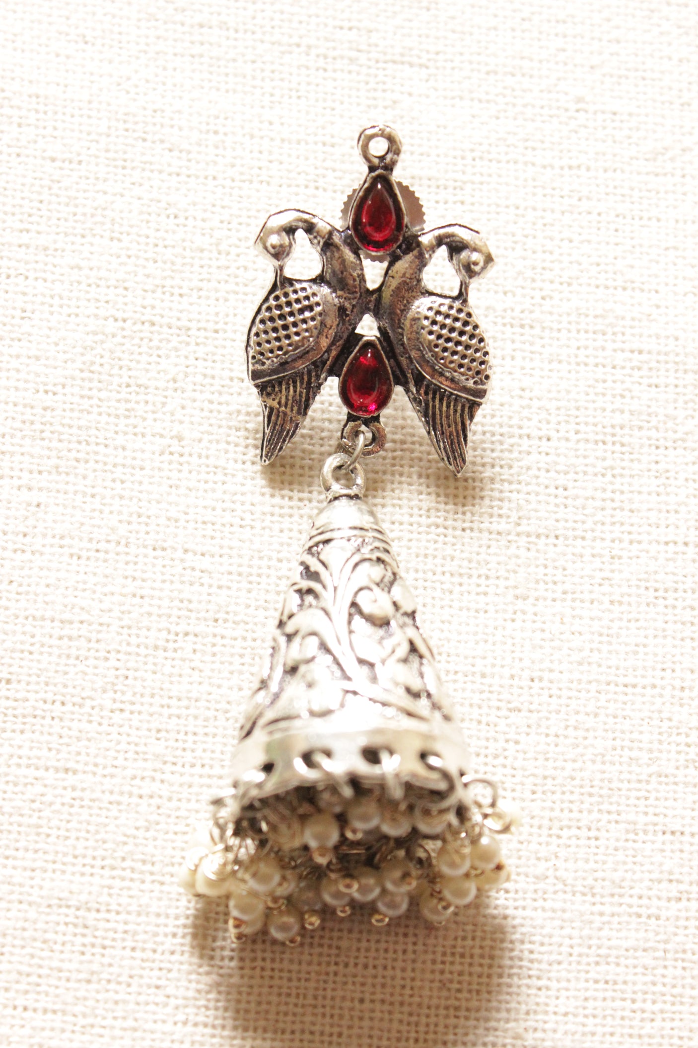 Red Glass Stones Embedded Oxidised Finish Bird Dangler Earrings