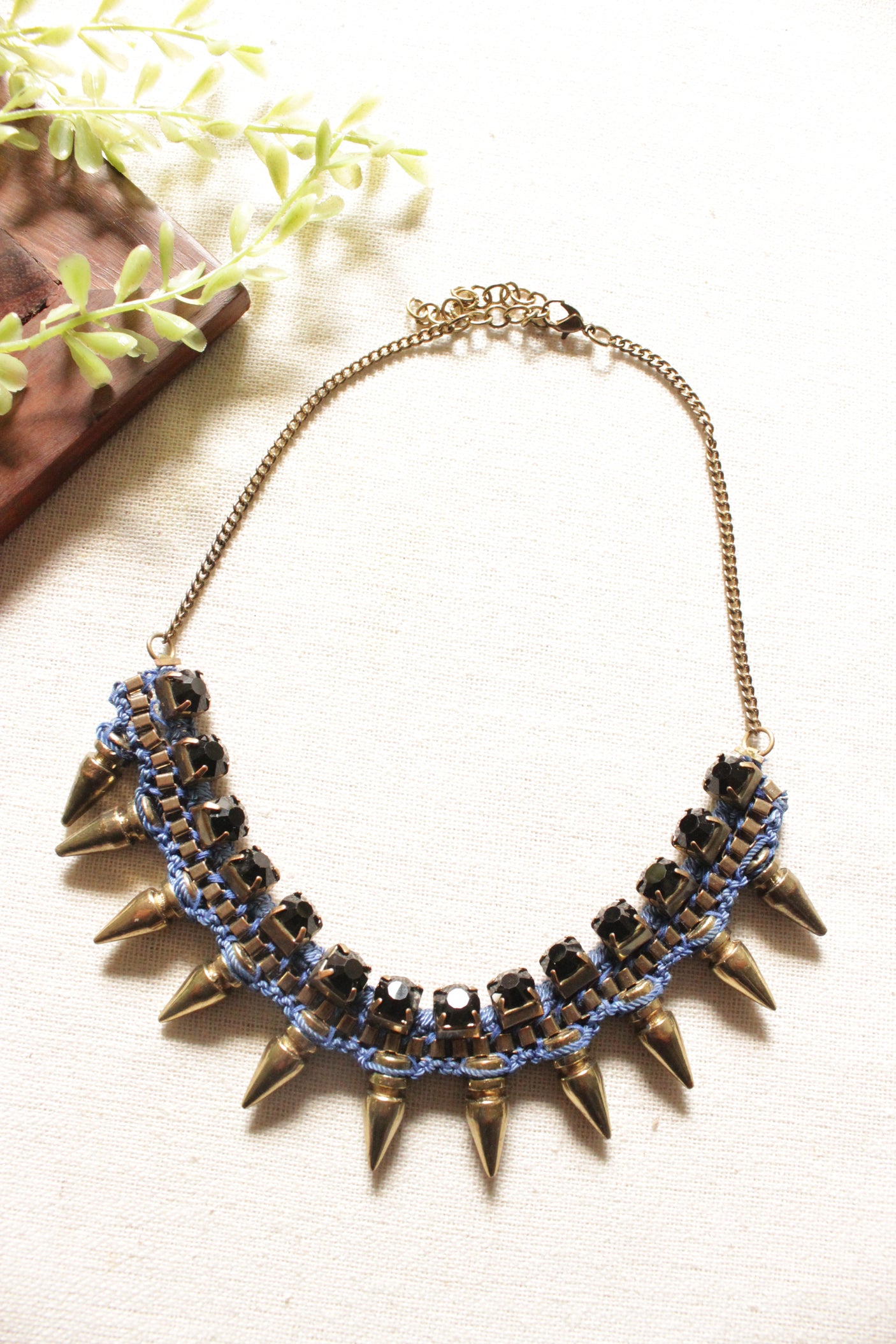 Black Beads and Dull Gold Metal Charms Braided with Blue Rope Necklace