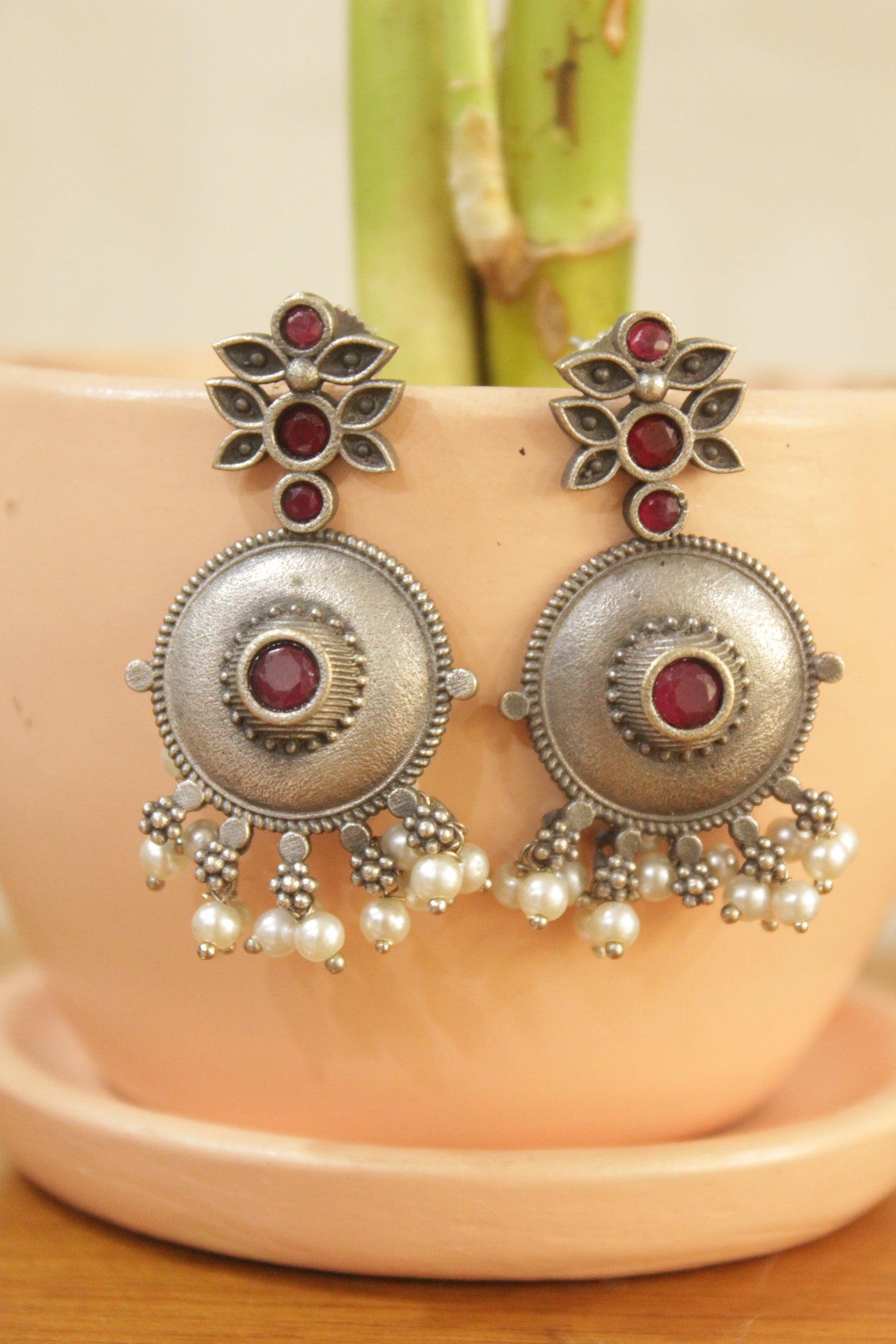 Red Glass Stones Embedded Oxidised Finish Brass Earrings