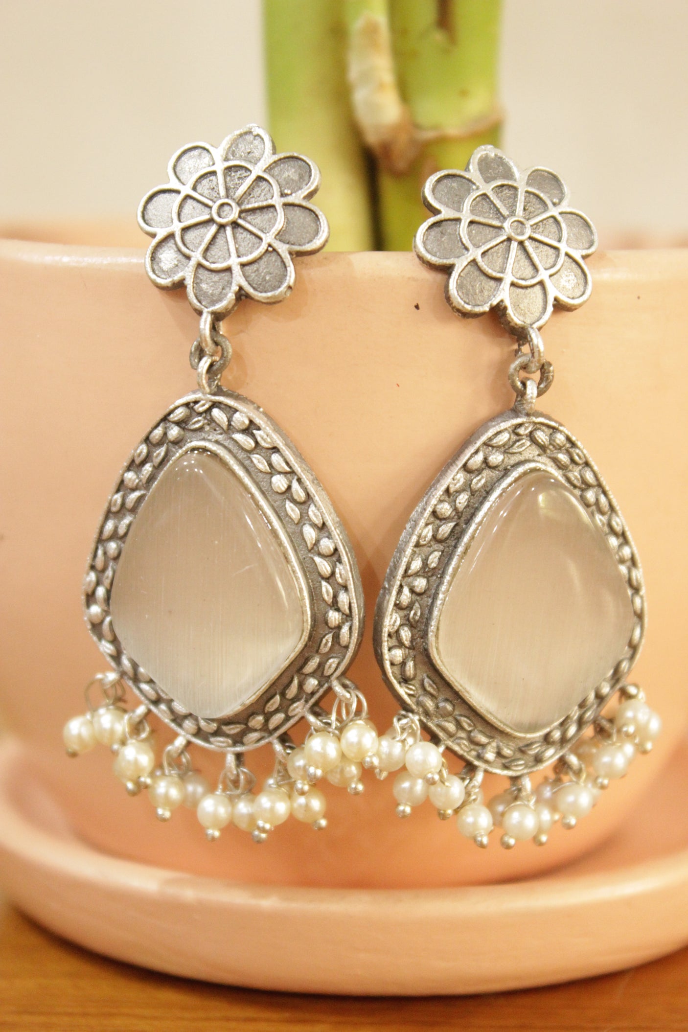 Ivory Center Stone Embedded Oxidised Finish Brass Earrings