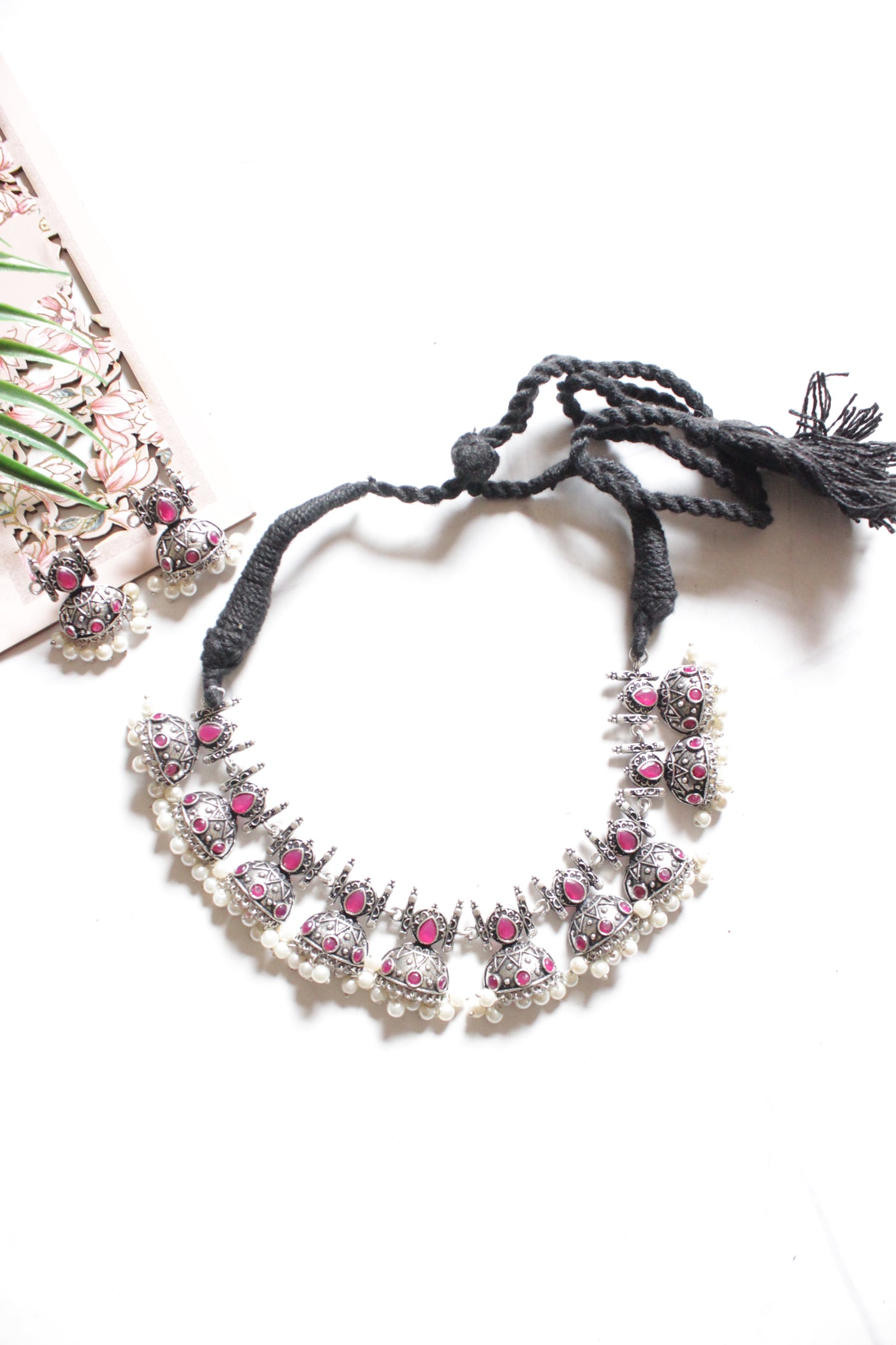 Oxidised Finish Choker Necklace Set Embedded with Red Stones and Jhumka Earrings