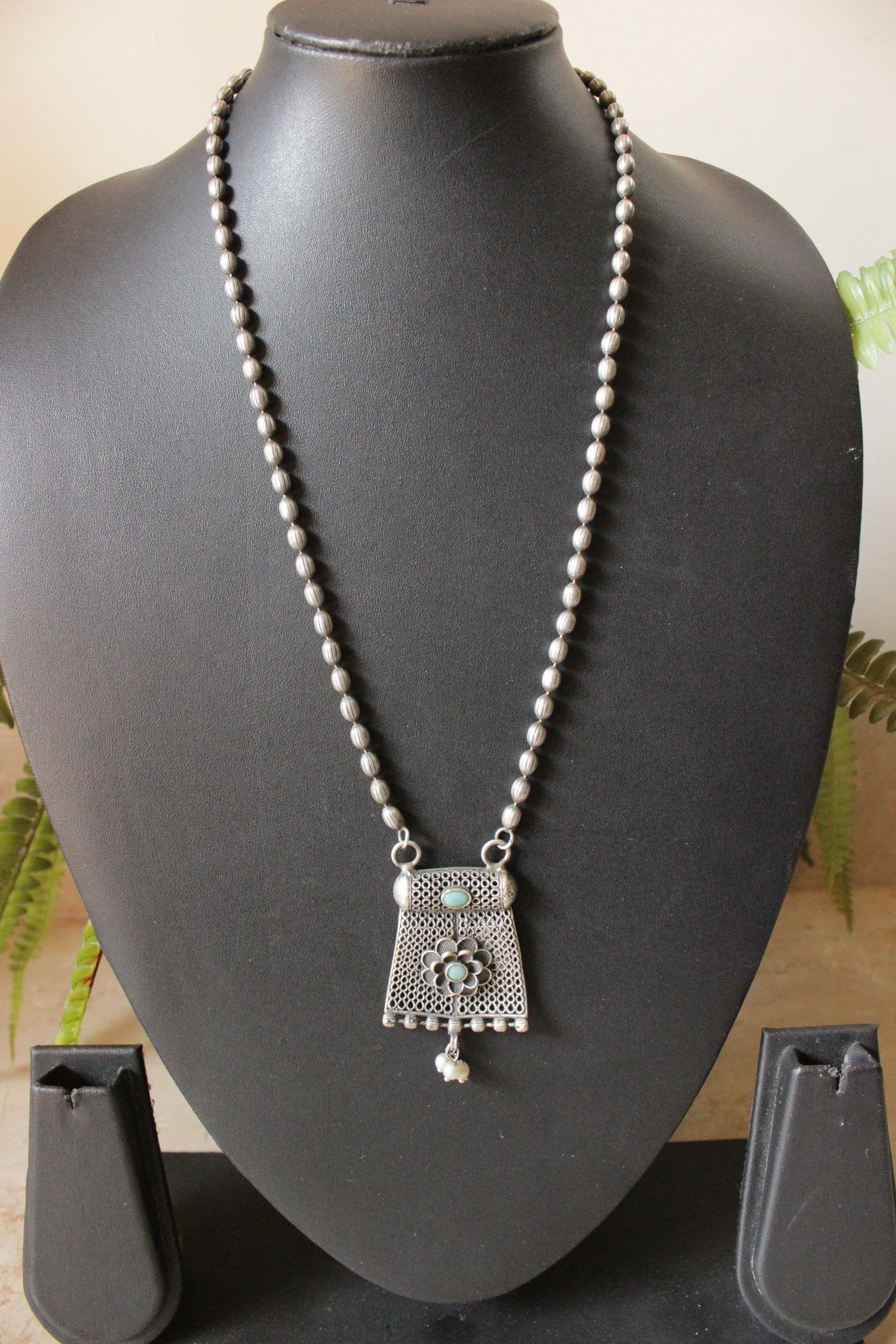 Oxidised Finish Dholki Beads German Silver Necklace with Blue Center Stone