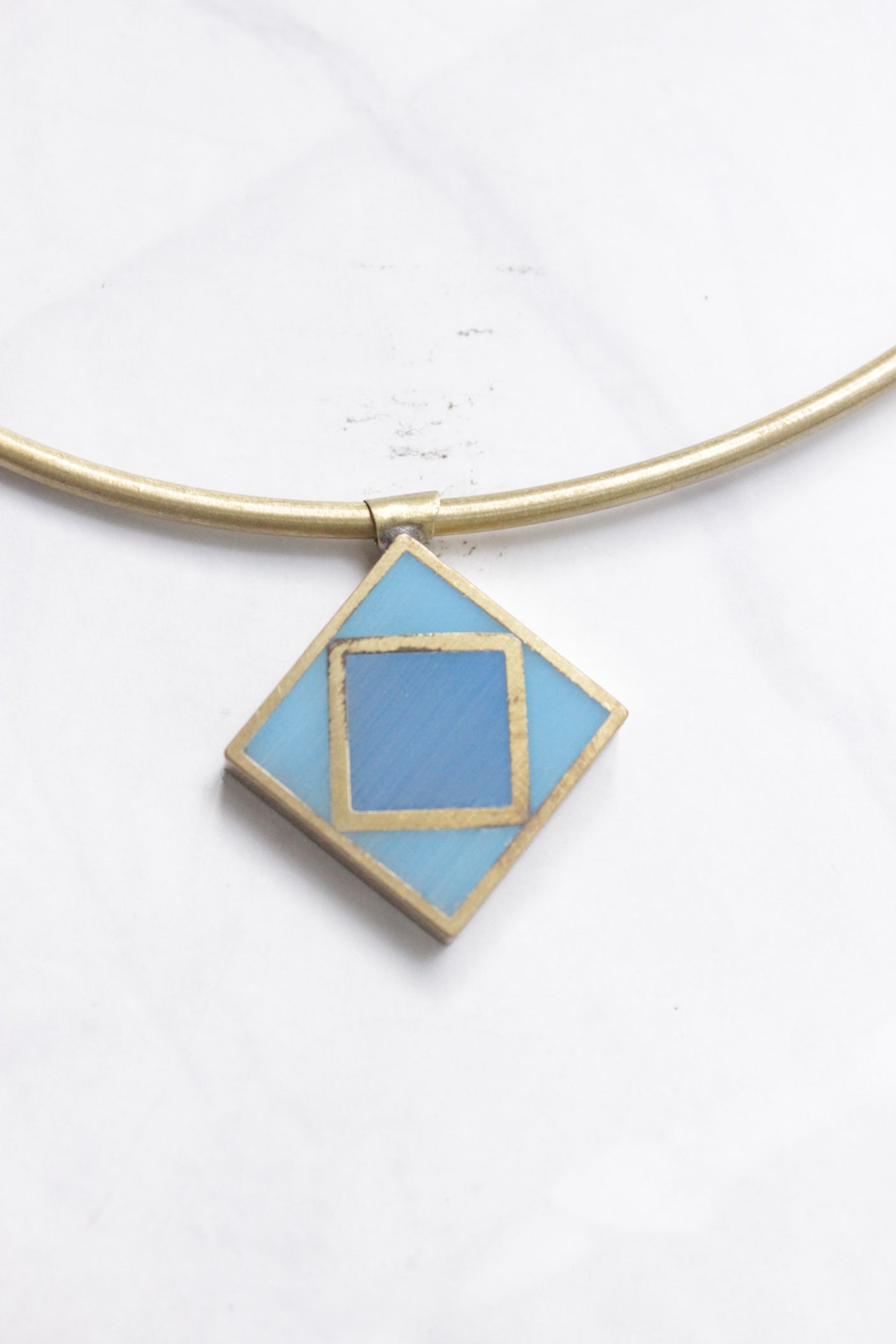 Gold Finish Metal Hasli with a Petite Wooden Blue Hand Painted Pendant