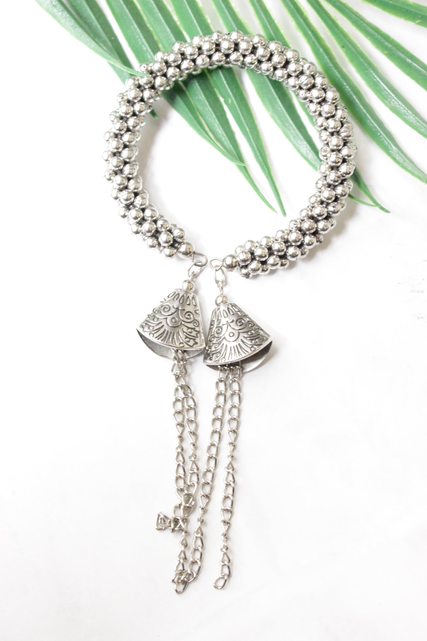 Silver Finish Bracelet with Hanging Metal Chain Strings