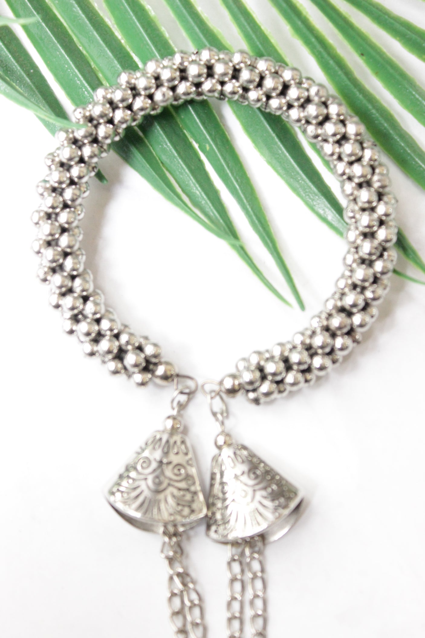 Silver Finish Bracelet with Hanging Metal Chain Strings