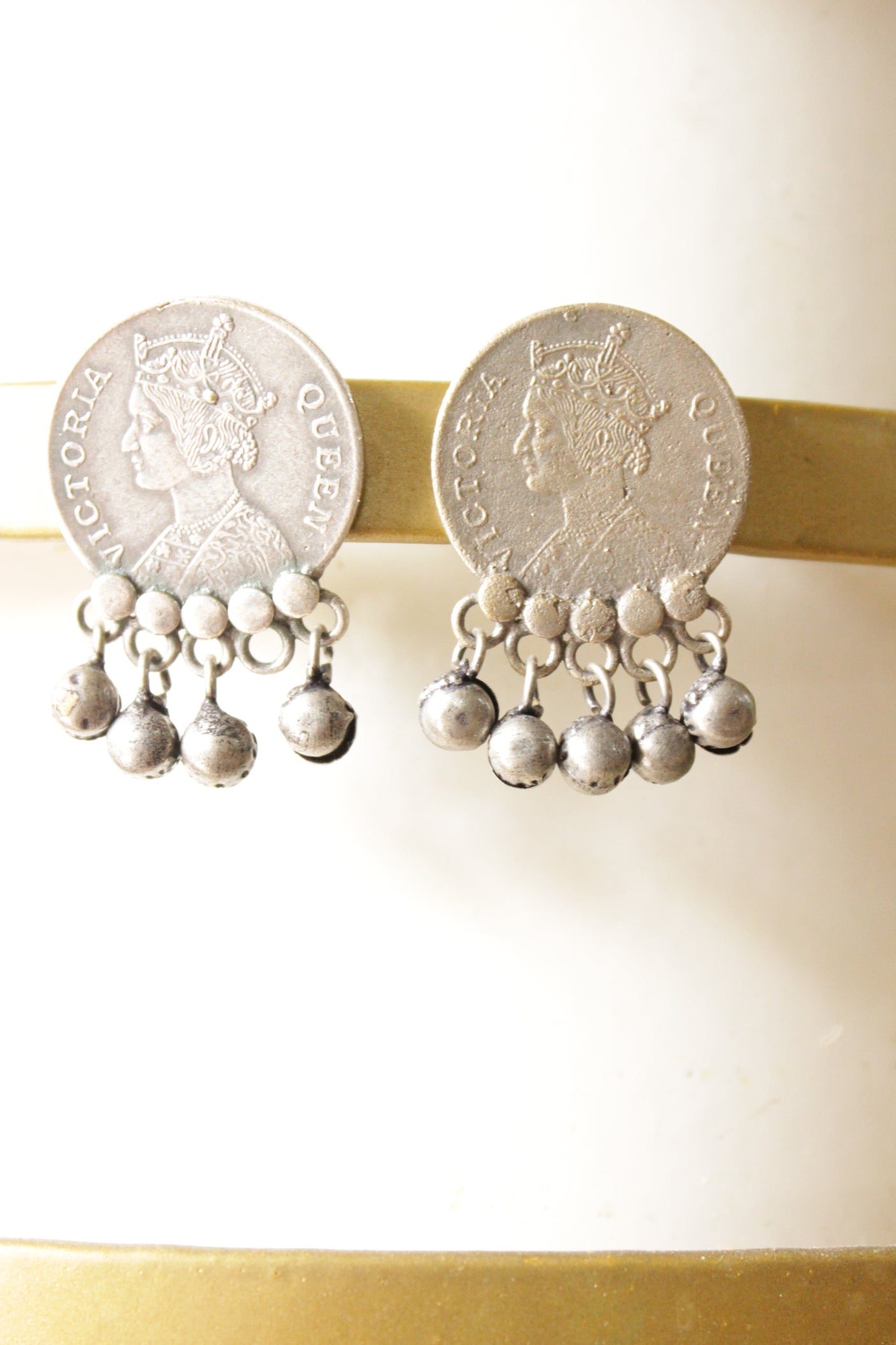 Ghungroo Beads Embellished Victoria Queen Embossed Oxidised Finish Metal Earrings