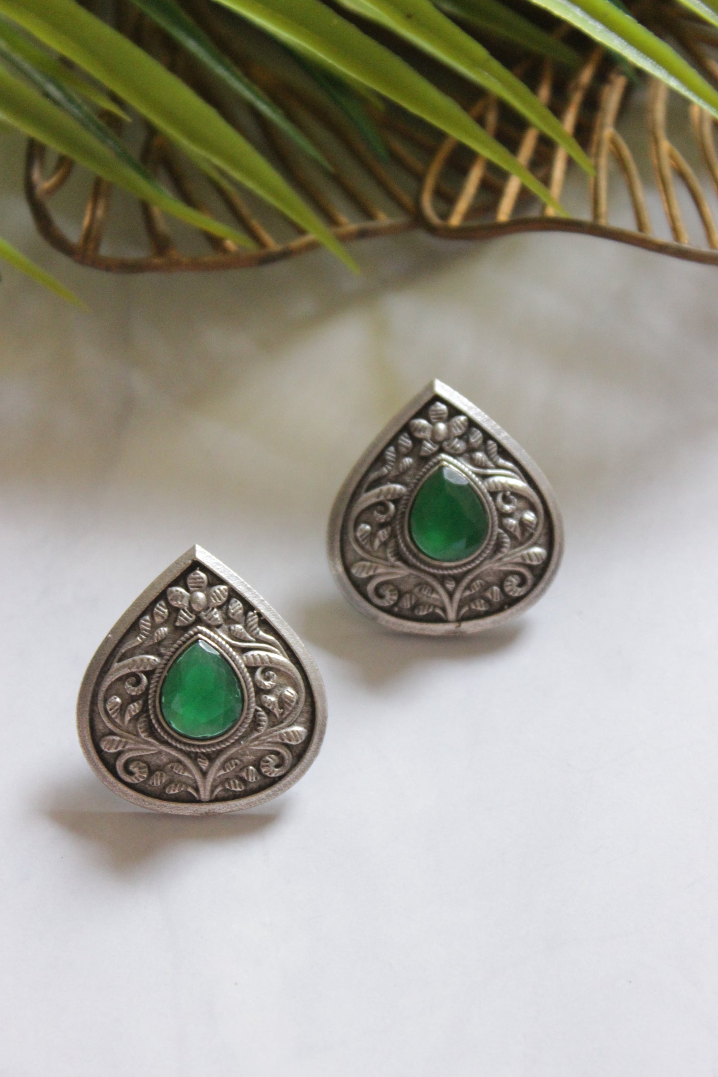 Premium Oxidised Finish Green Stone Embedded Tear Drop Shape Stud Earrings