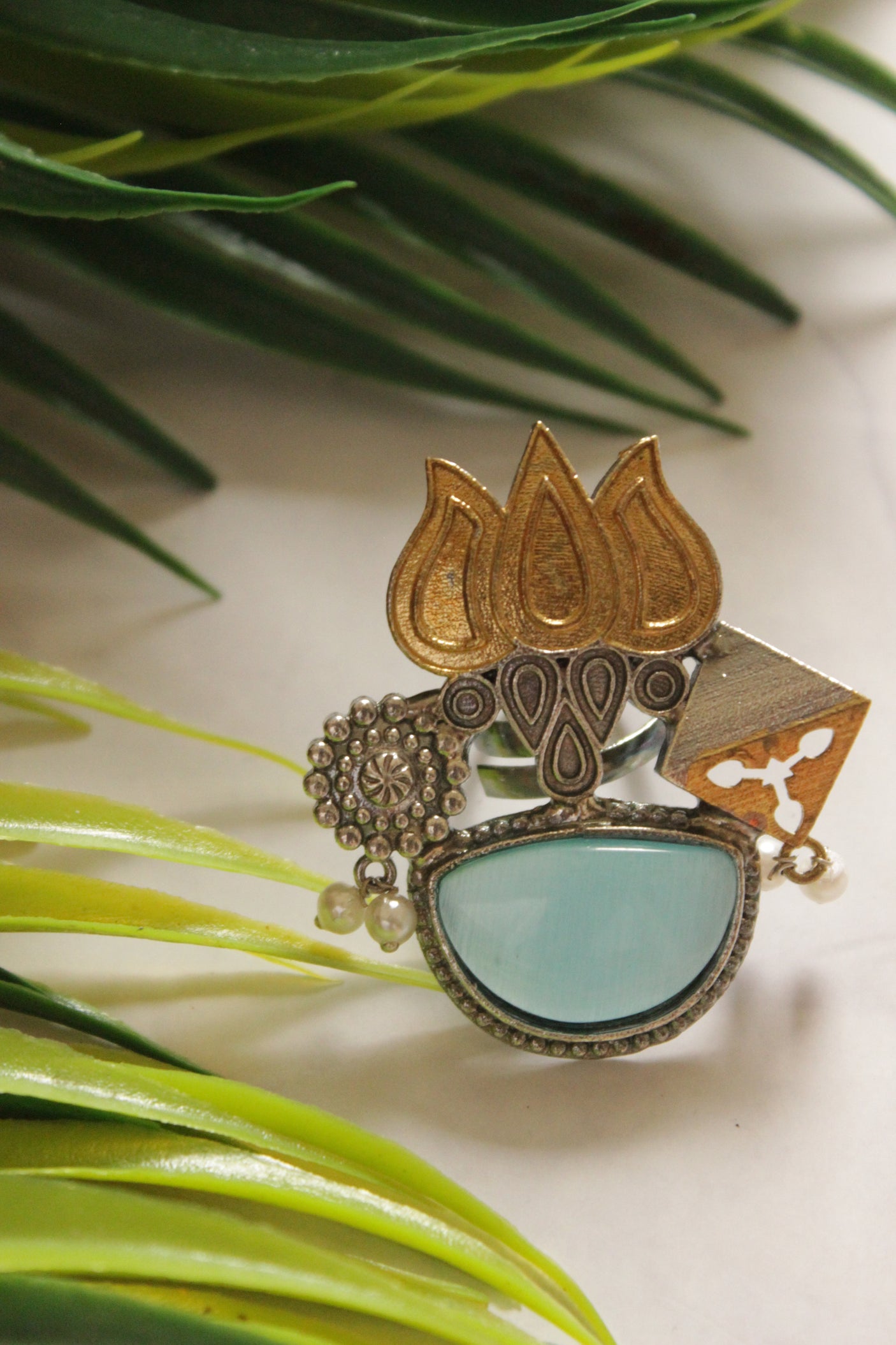 Dual Tone Premium Lotus Motif Blue Stone Embedded Statement Cocktail Ring