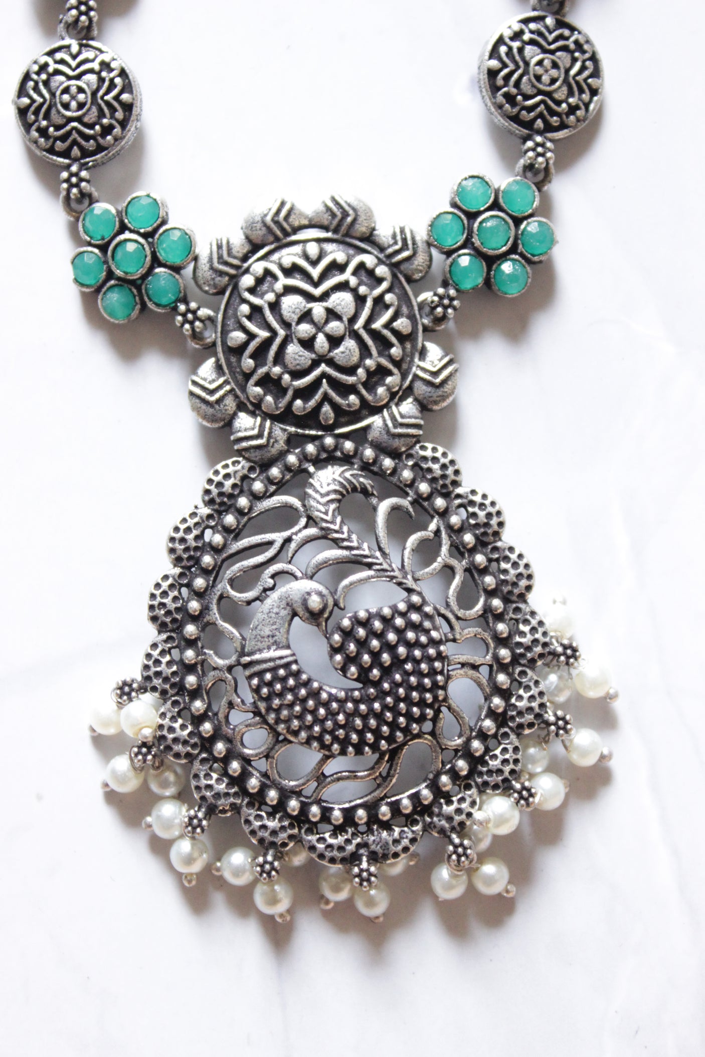 Green Stones Embedded Oxidised Finish Peacock Pendant Chain Necklace