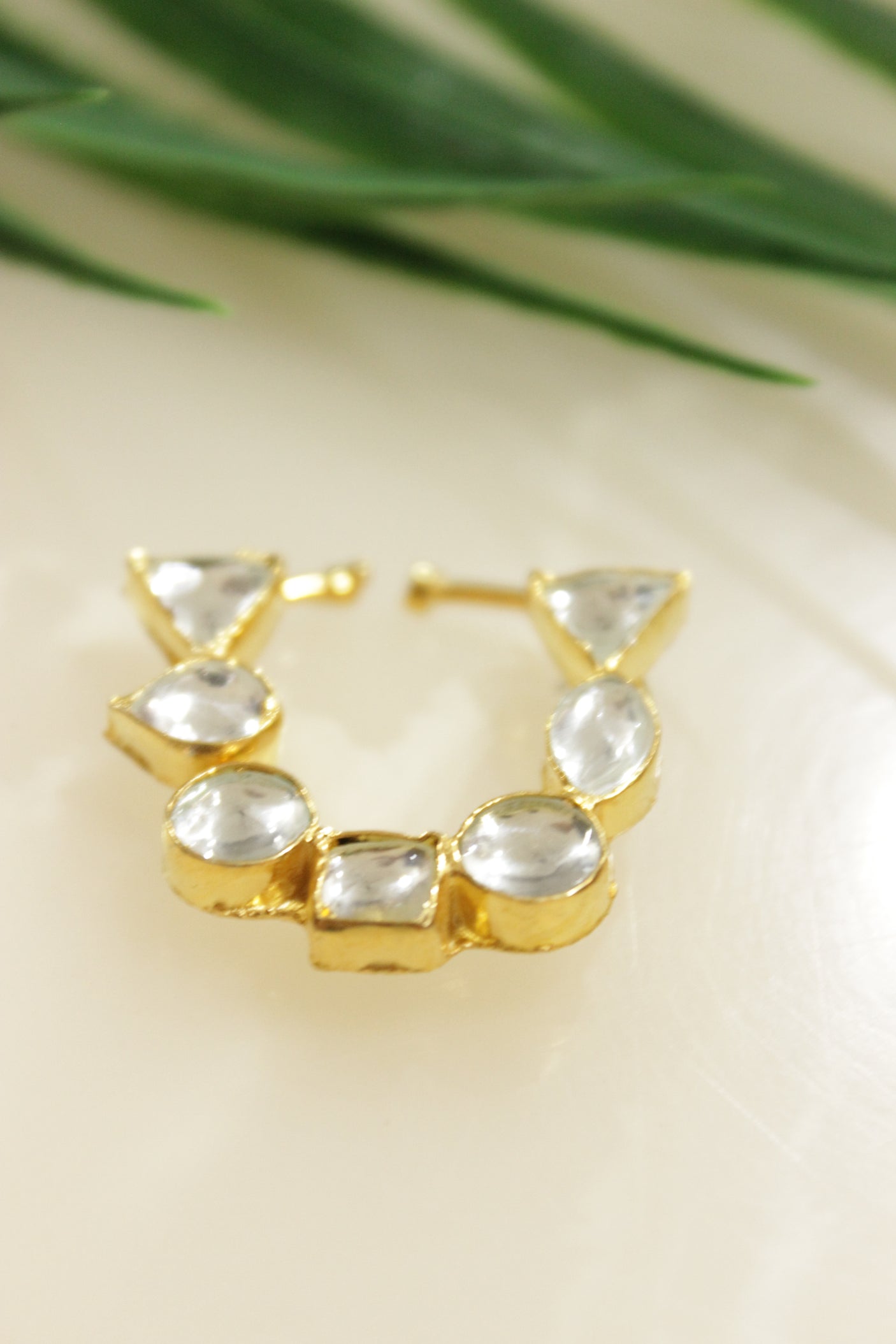 White Stones Embedded Gold Finish Clip On Nosepin/Septum Ring