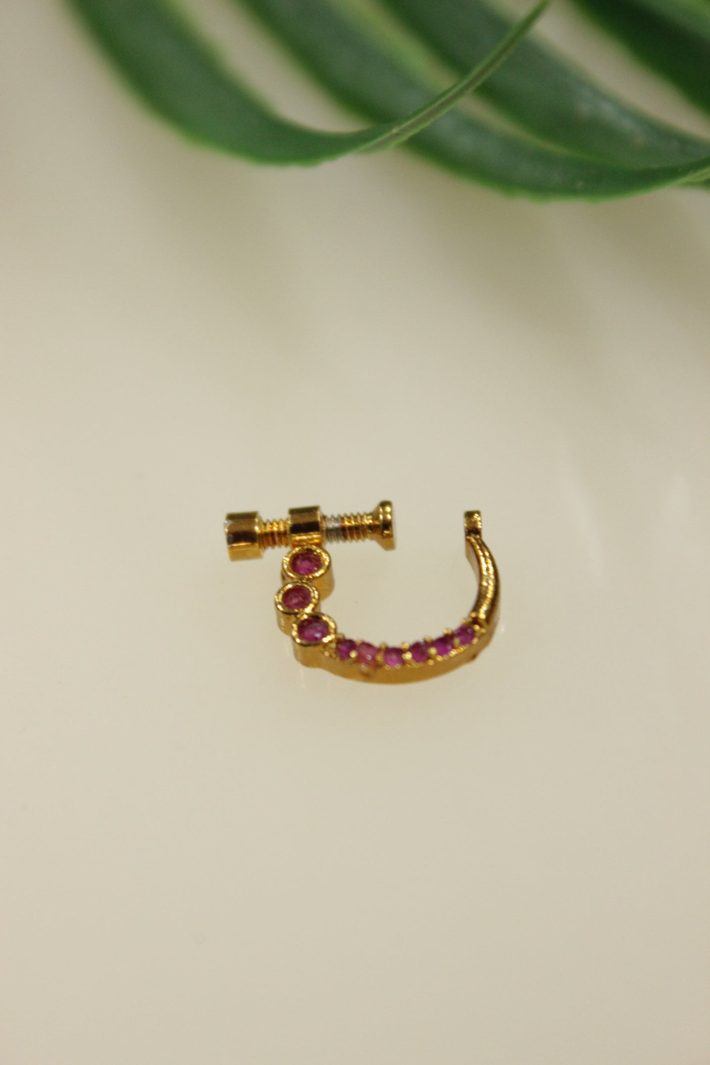 Pink Glass Stones Embedded Gold Finish Clip On Nosepin