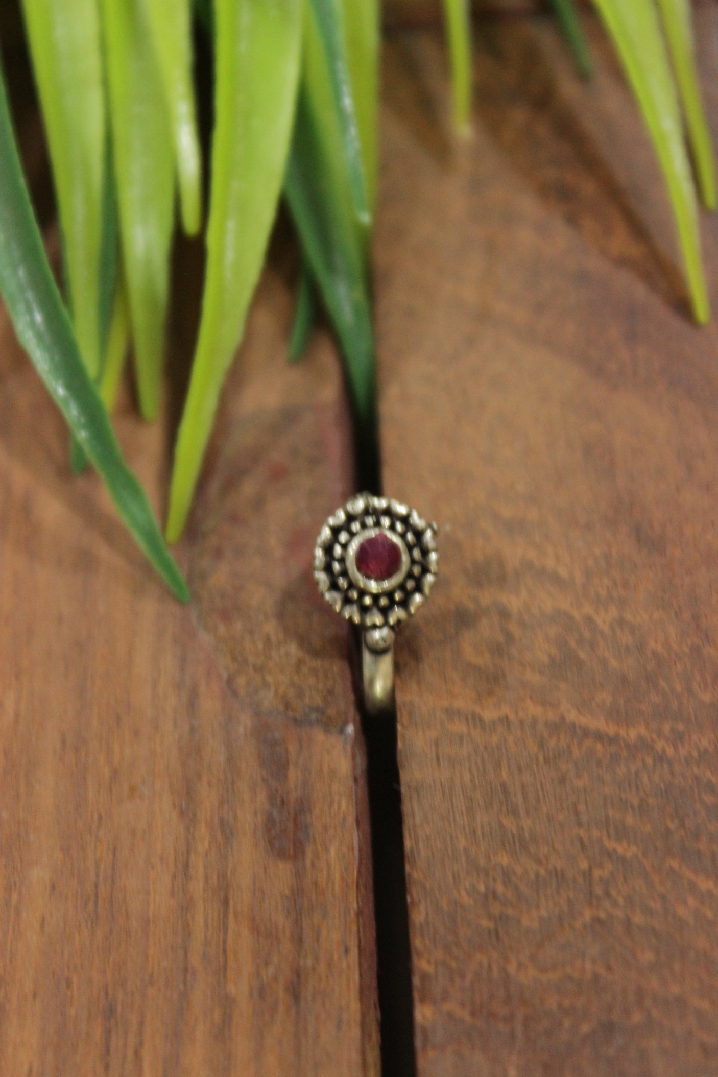 Ruby Red Center Stone Embedded Circular Oxidised Finish Clip On Nosepin