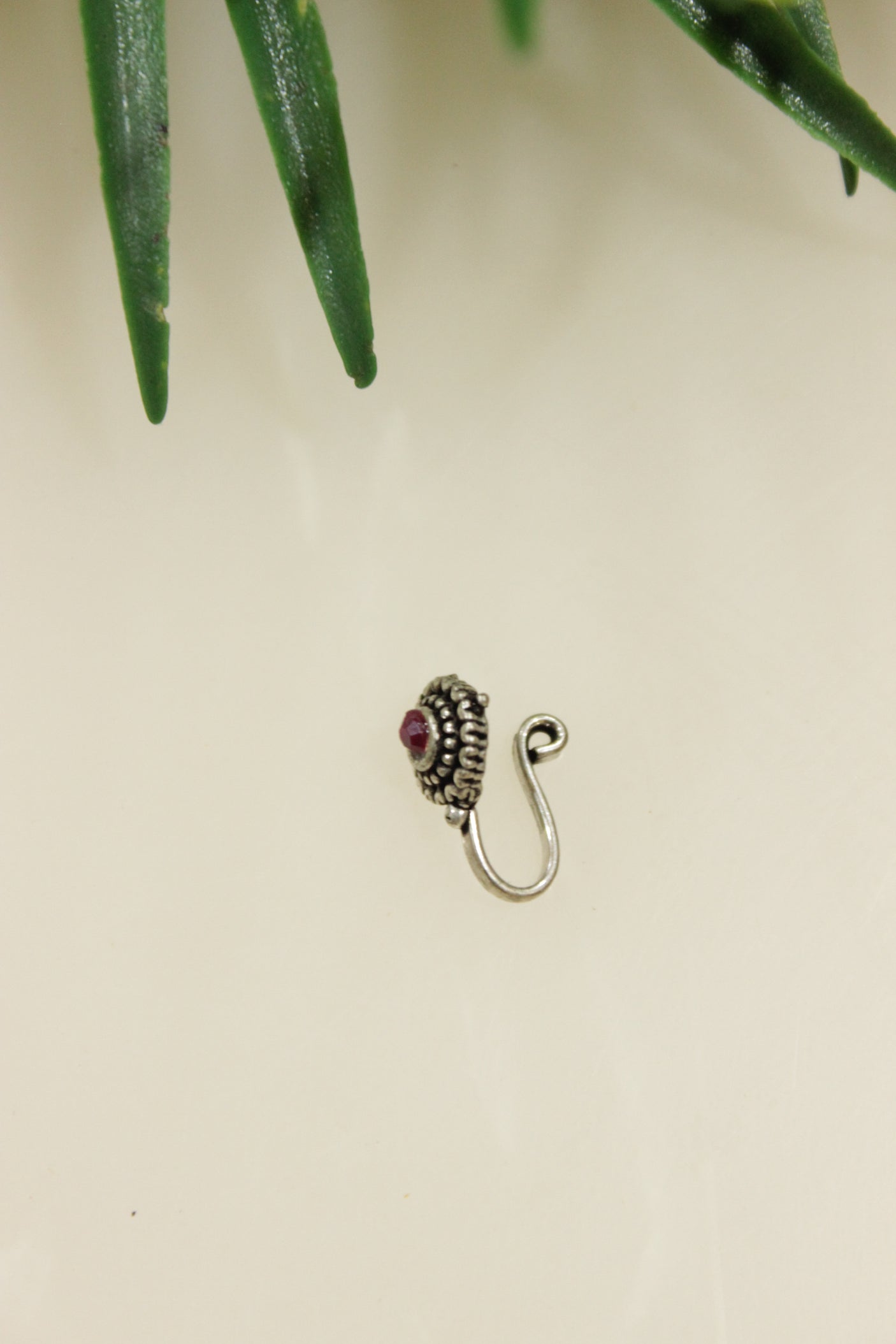 Ruby Red Center Stone Embedded Circular Oxidised Finish Clip On Nosepin