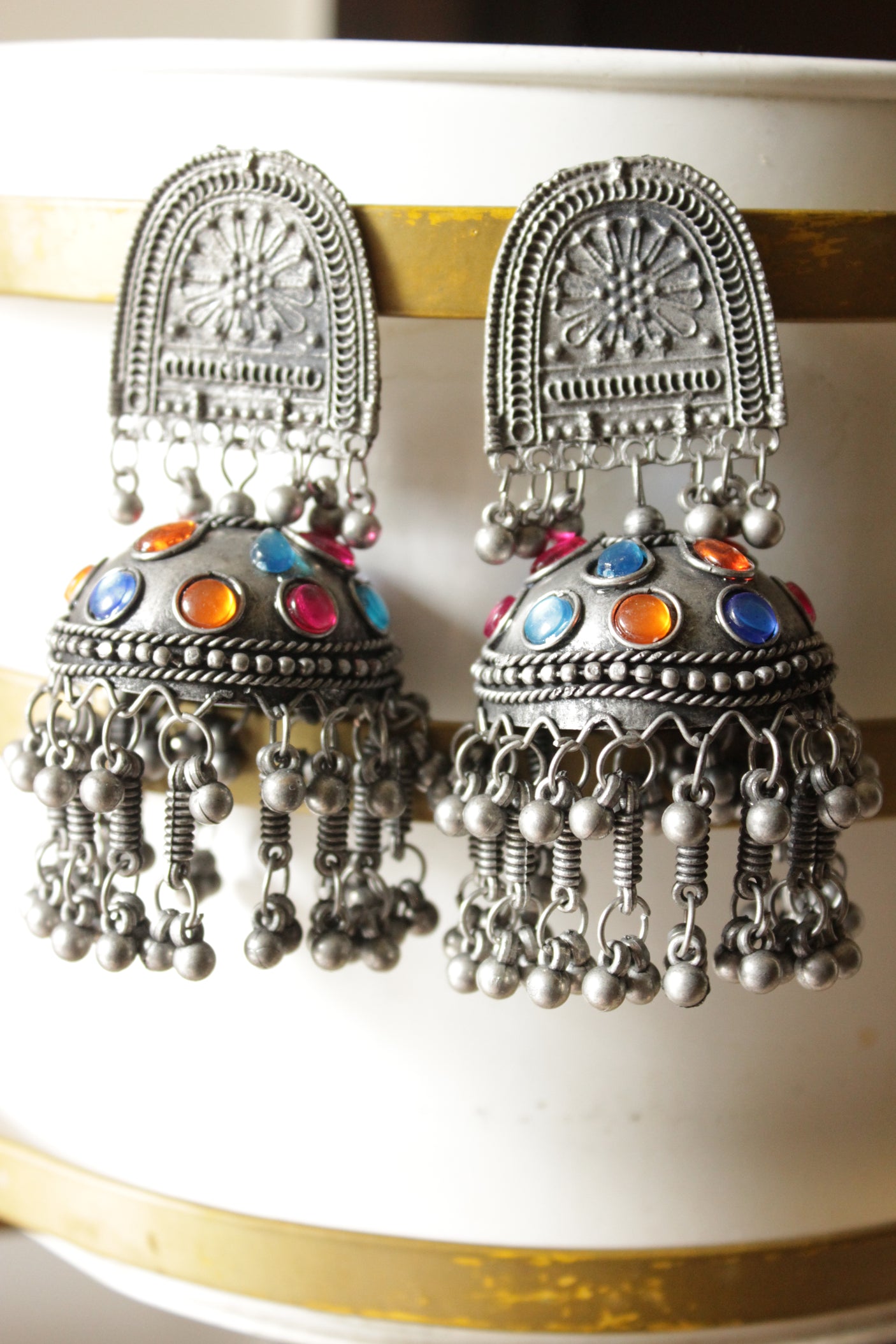 Multi-Color Stones Embedded Premium Oxidised Finish Jhumka Earrings