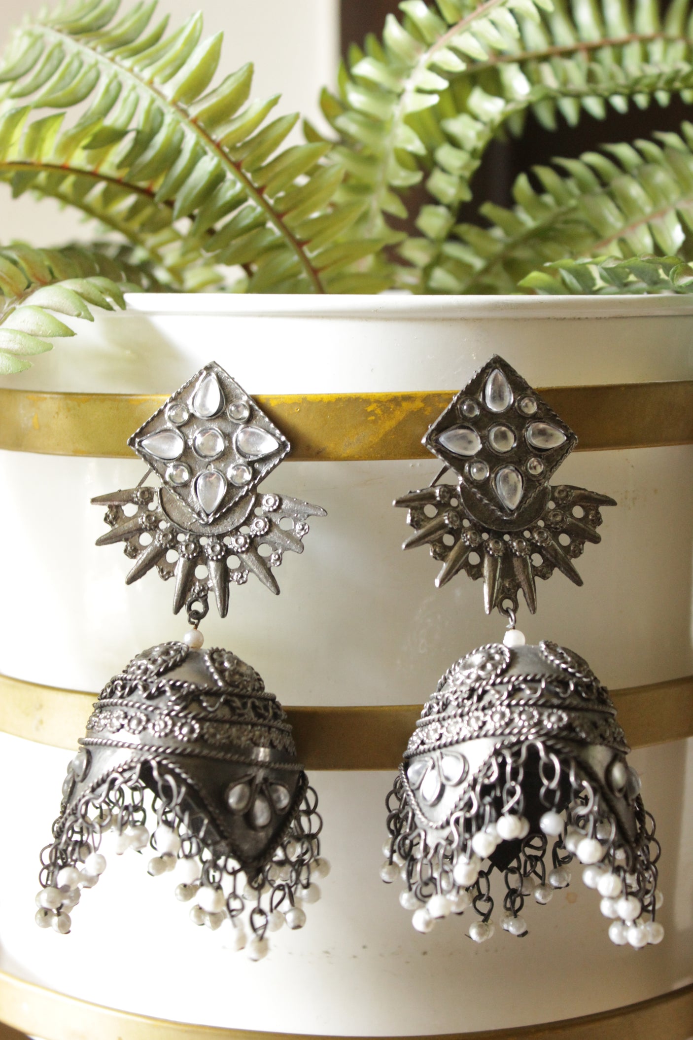 White Stones Embedded Premium Oxidised Finish Jhumka Earrings