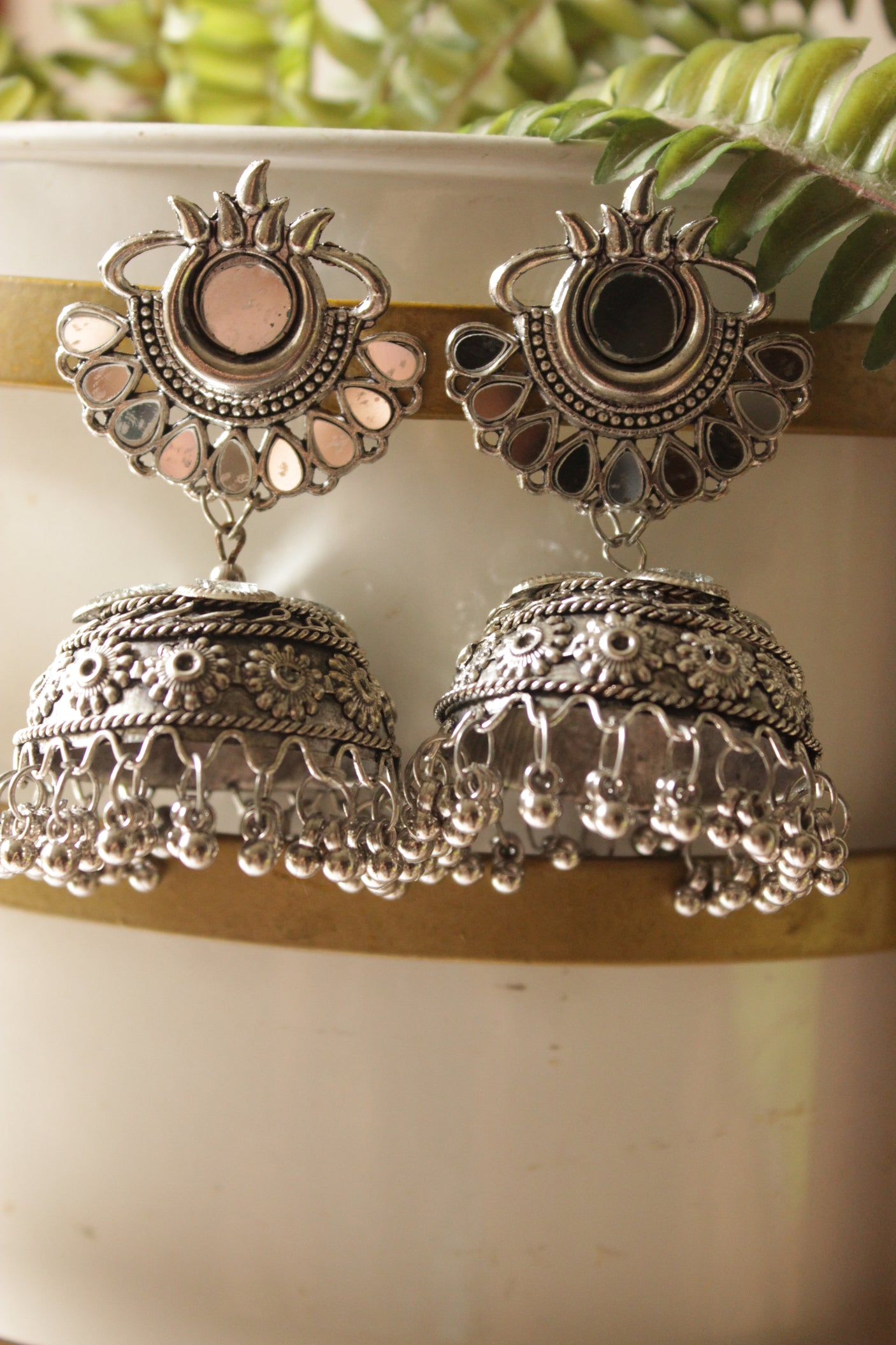 Mirrors Embedded Oxidised Finish Jhumka Earrings