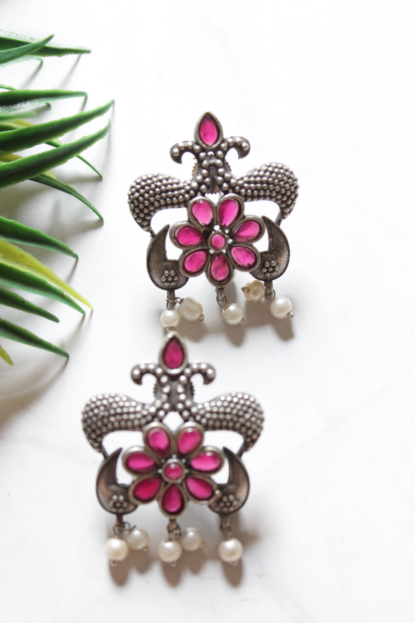 Pink Stones Embedded Oxidised Finish Stud Earrings