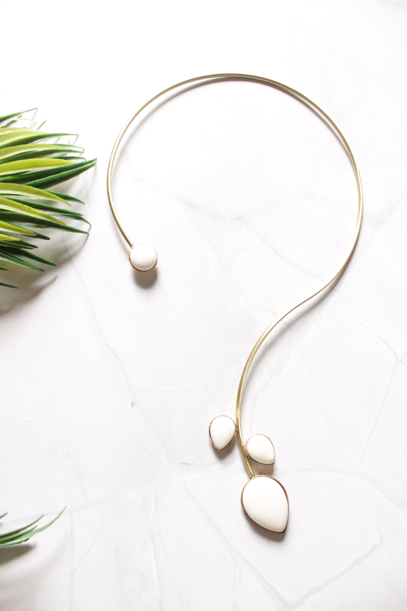 White Stone Embedded Gold Finish Hasli Necklace