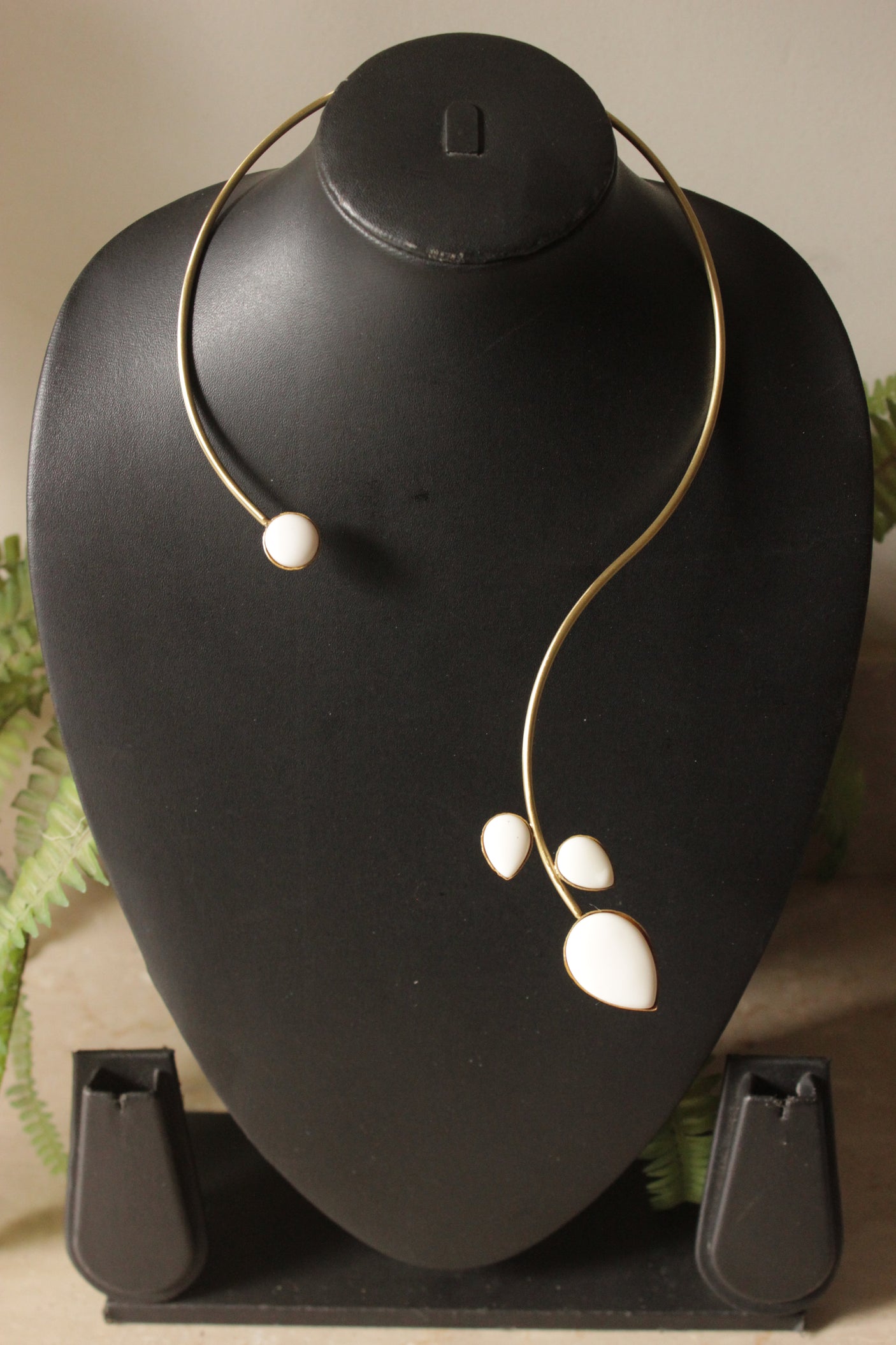 White Stone Embedded Gold Finish Hasli Necklace