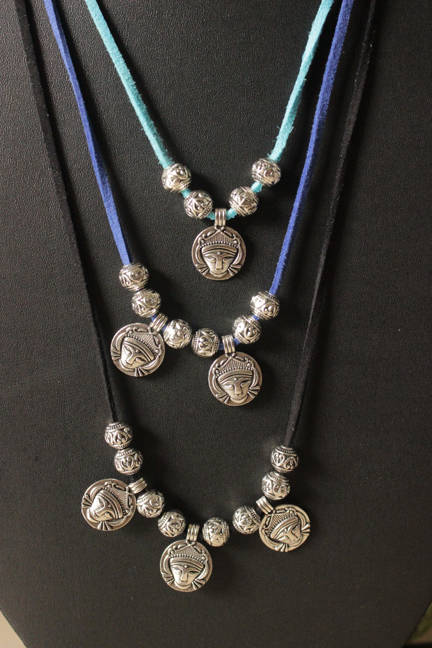 3 Layer Rope Necklace with Religious Motif Stamped Metal Charms