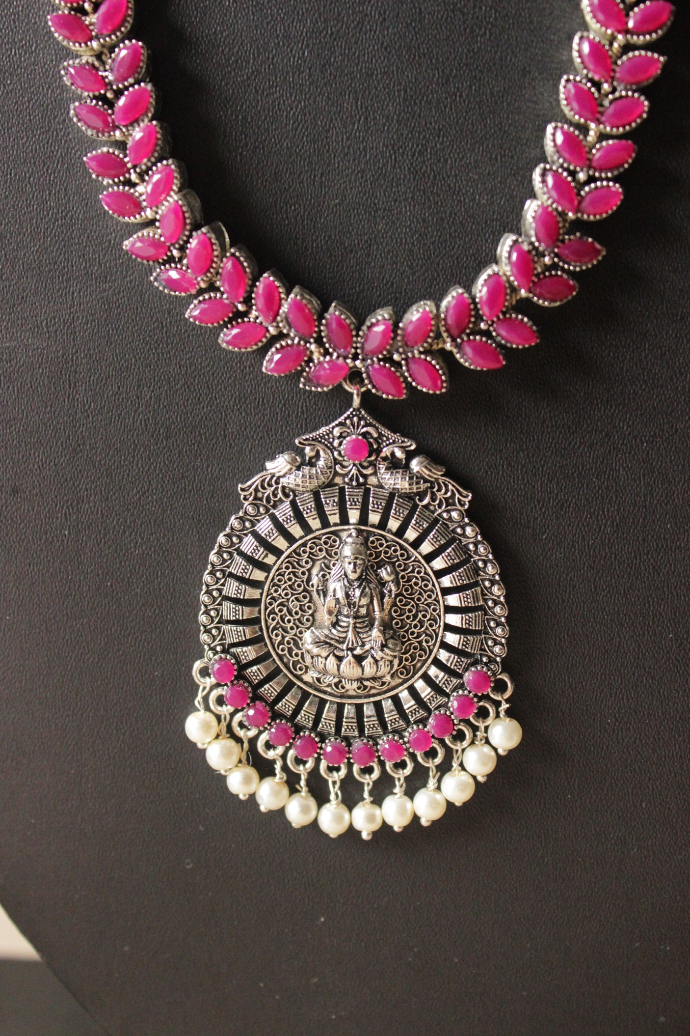 Fuchsia Glass Stones Embedded Religious Motif Adjustable Length Metal Necklace Set with Jhumka Earrings