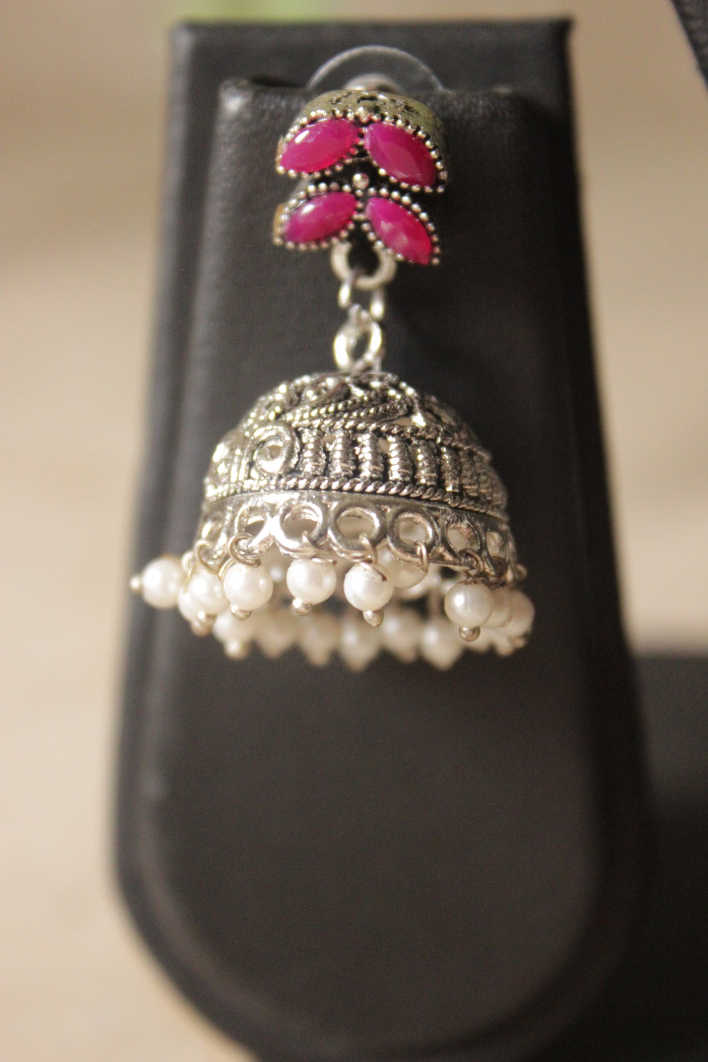 Fuchsia Glass Stones Embedded Religious Motif Adjustable Length Metal Necklace Set with Jhumka Earrings