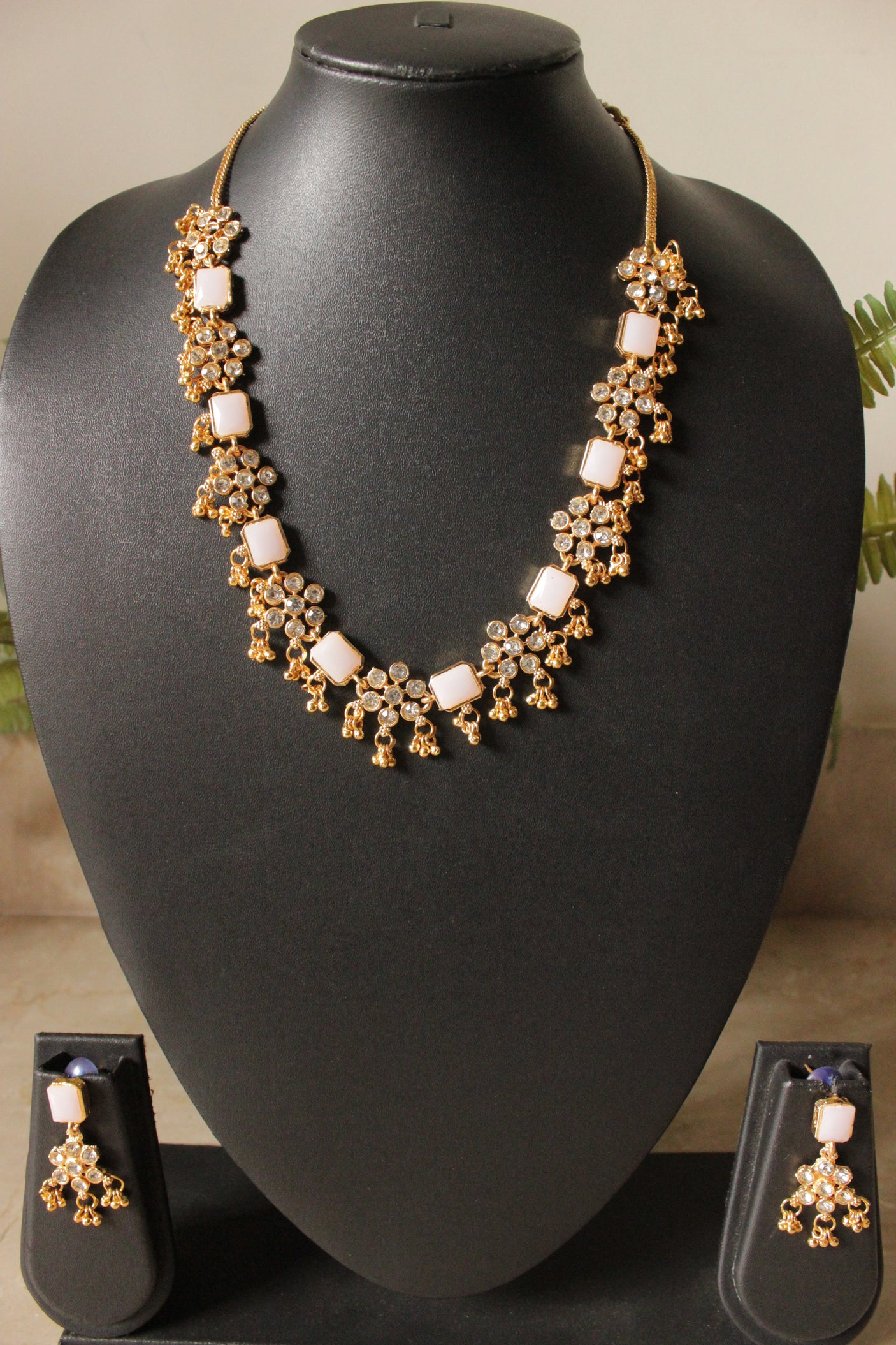 Ivory Natural Gemstones Embedded Gold Toned Choker Necklace Set with Adjustable Closure