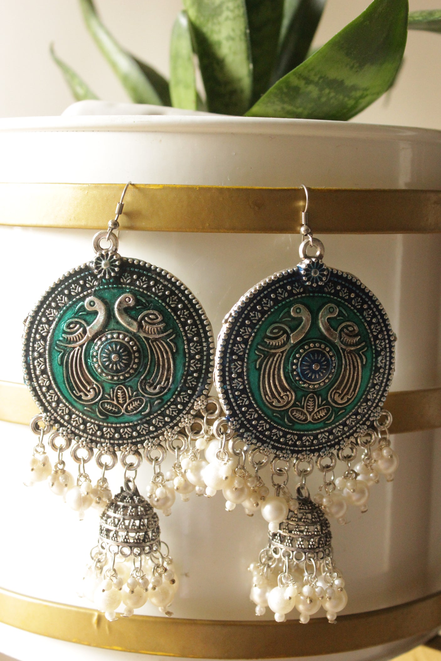 Turquoise Enamel Painted Intricately Detailed Oxidised Finish Peacock Motif Jhumka Earrings