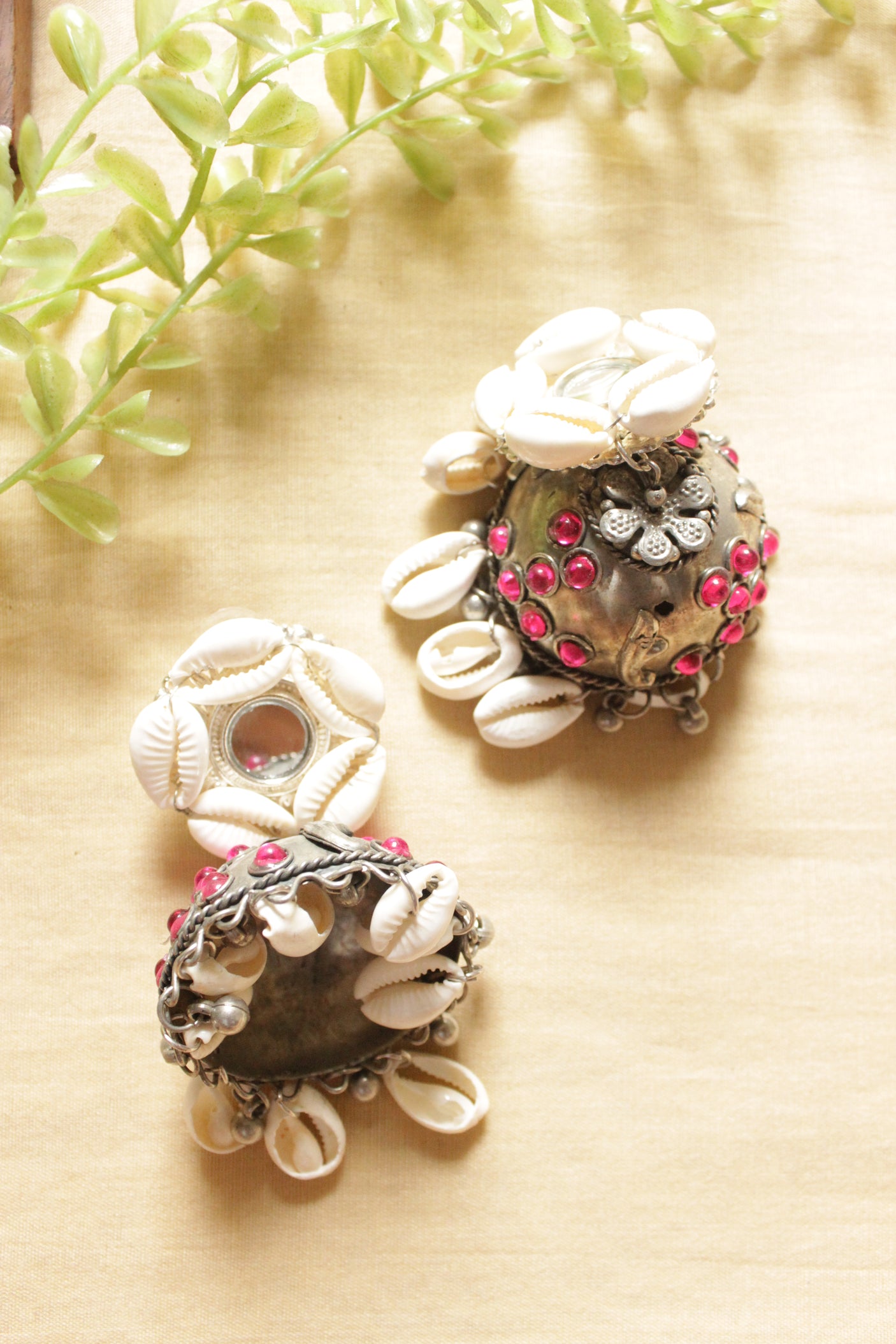 Pink Stones Embedded Oxidised Silver Finish Shell Work Jhumka Earrings
